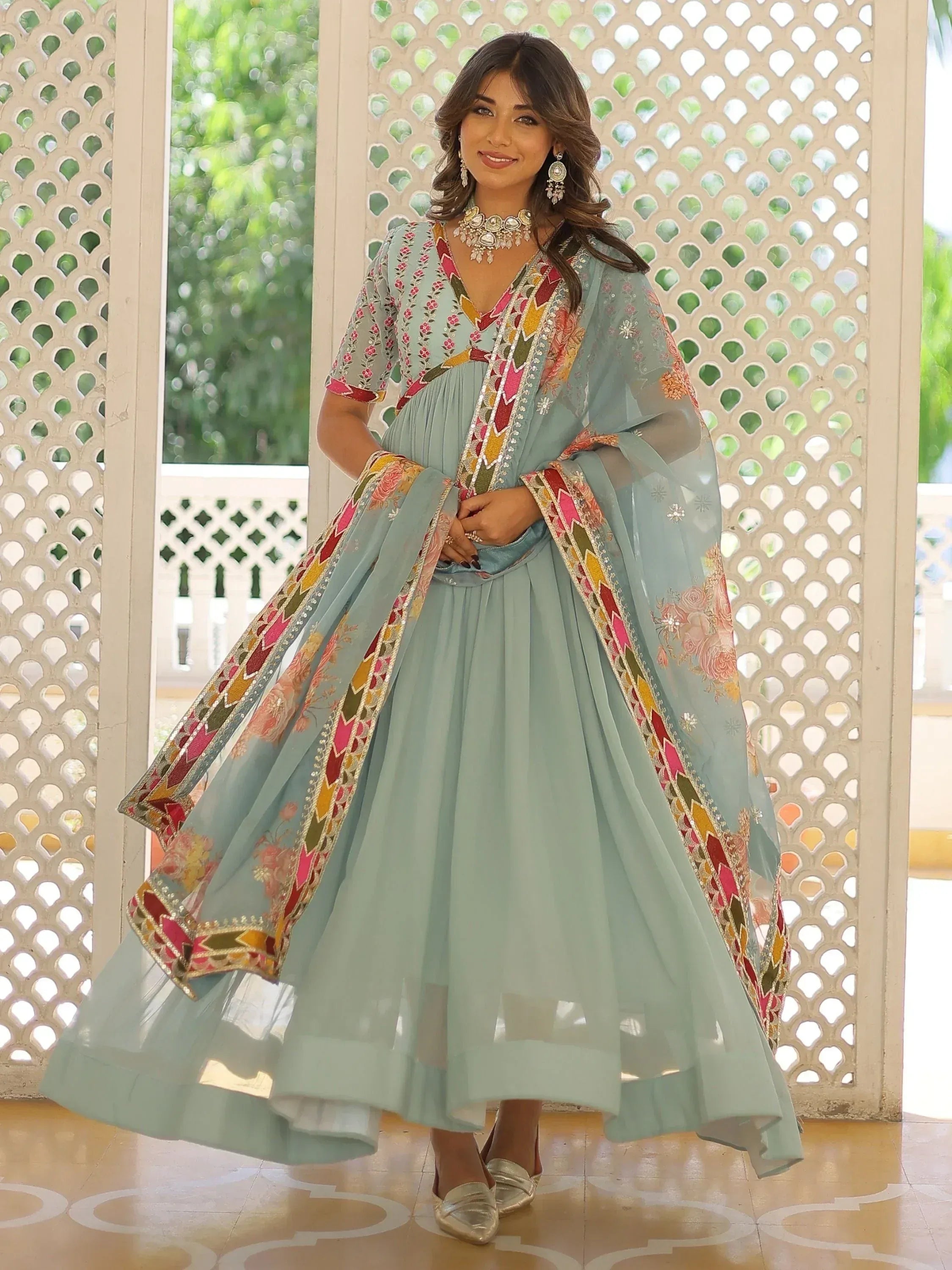 Mint green embroidered anarkali suit with colorful dupatta, perfect for Indian ethnic occasions