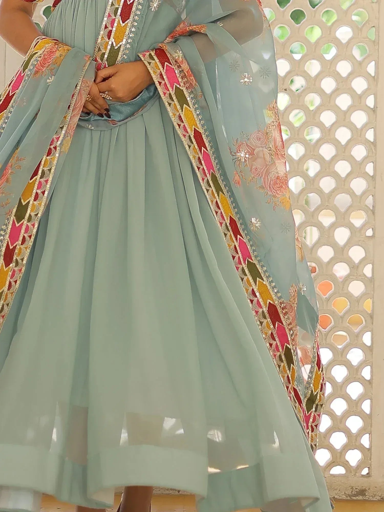 Mint green ethnic anarkali with floral dupatta, perfect for Indian weddings and festive occasions