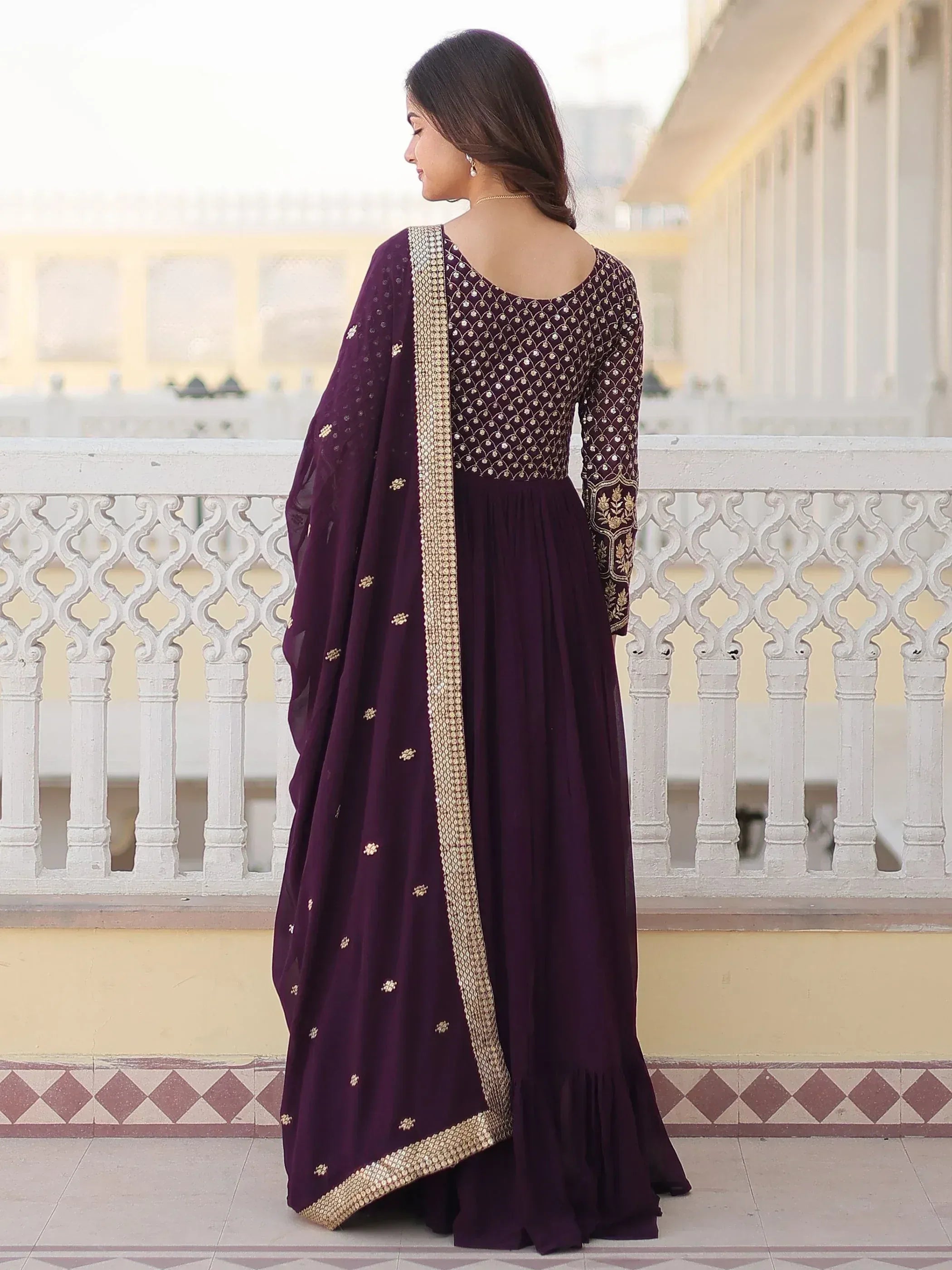 Purple ethnic anarkali suit with gold embroidery and dupatta, perfect for Indian occasions