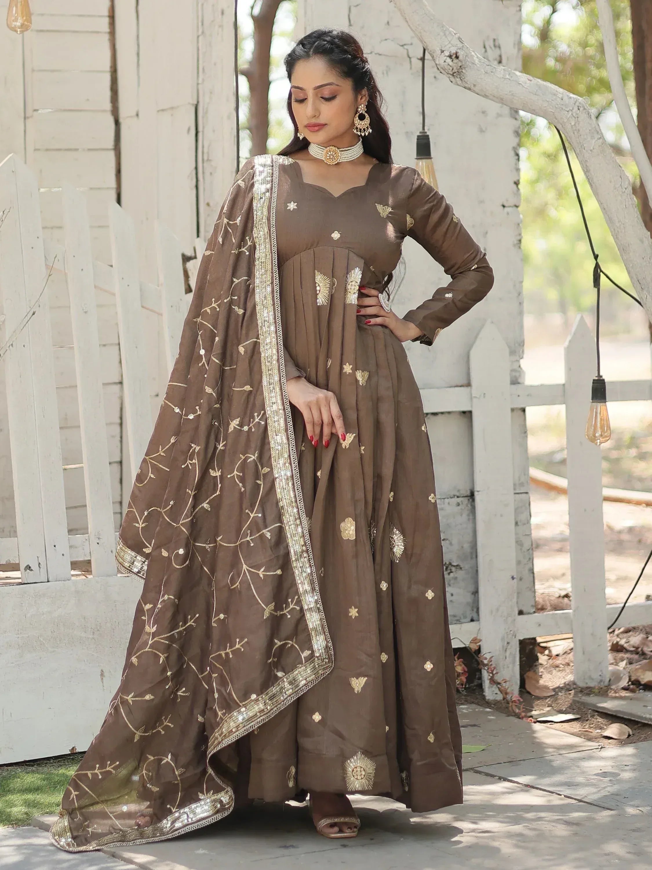 Brown embroidered anarkali suit with gold detailing, perfect for Indian ethnic wear occasions