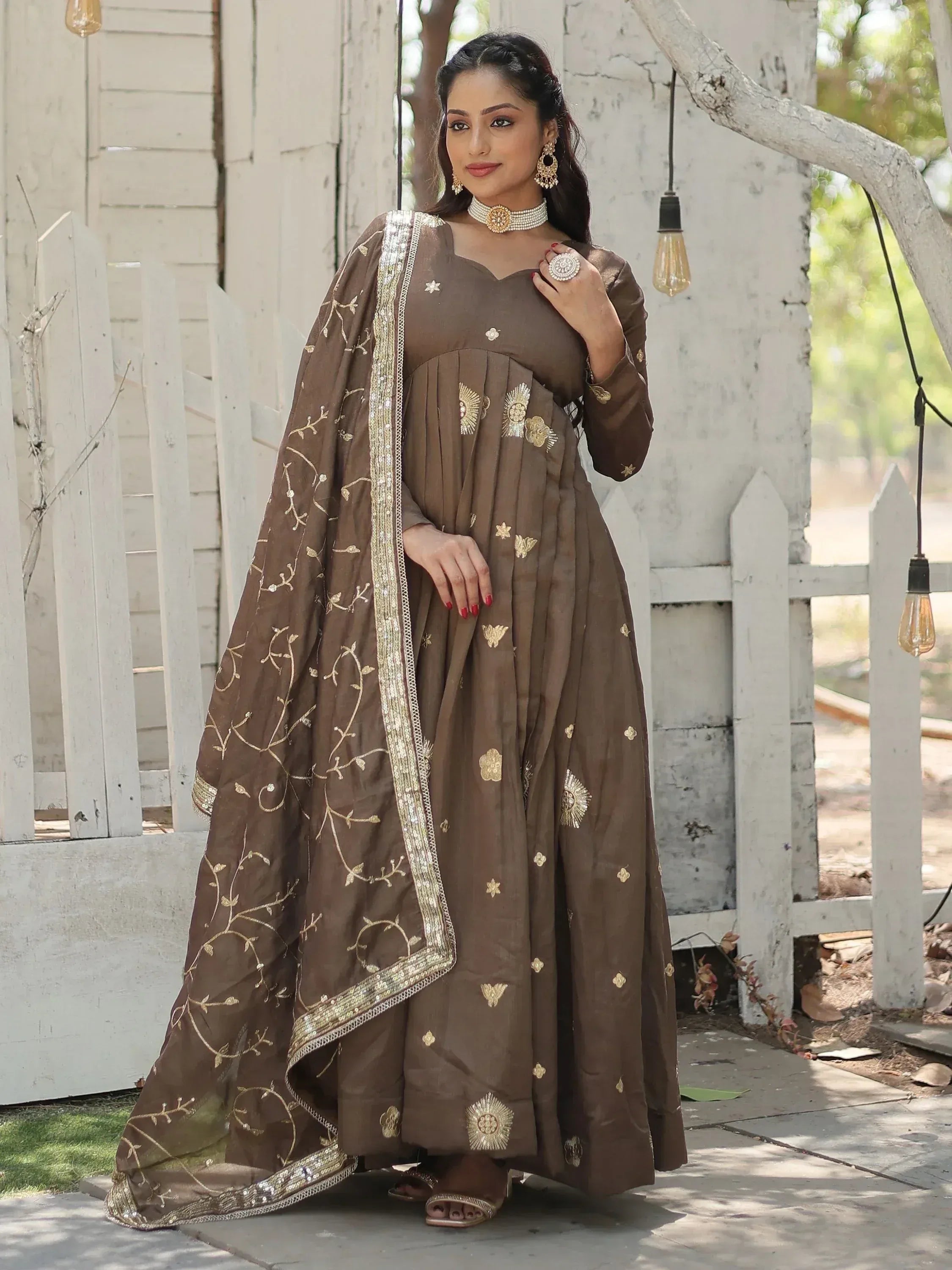 Brown embroidered anarkali suit with gold detailing, perfect for Indian ethnic wear occasions