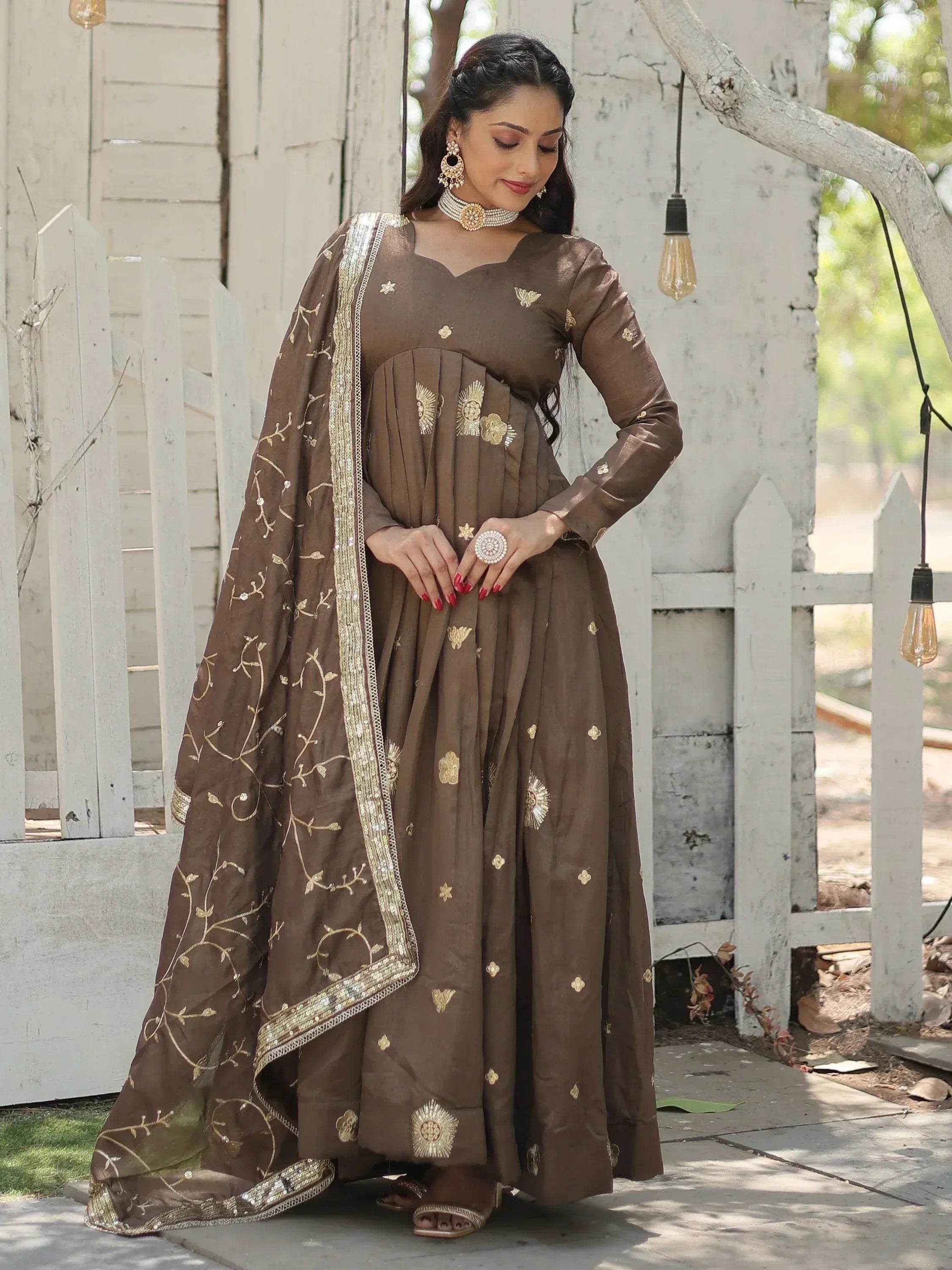 Brown embroidered anarkali suit with gold detailing, perfect for Indian ethnic wear occasions