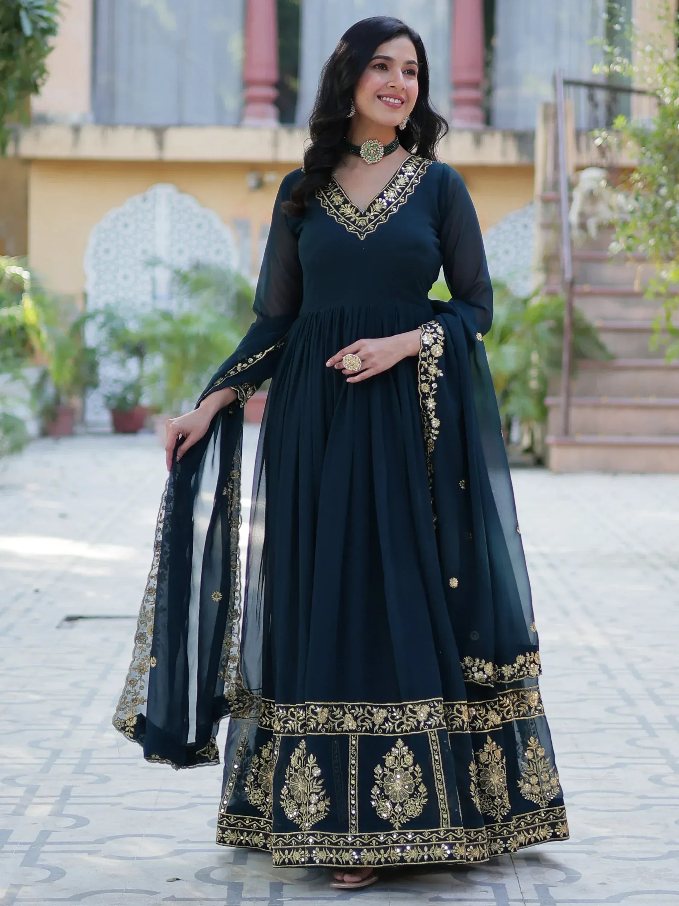 Elegant navy blue anarkali with gold embroidery, perfect for Indian ethnic wear occasions.