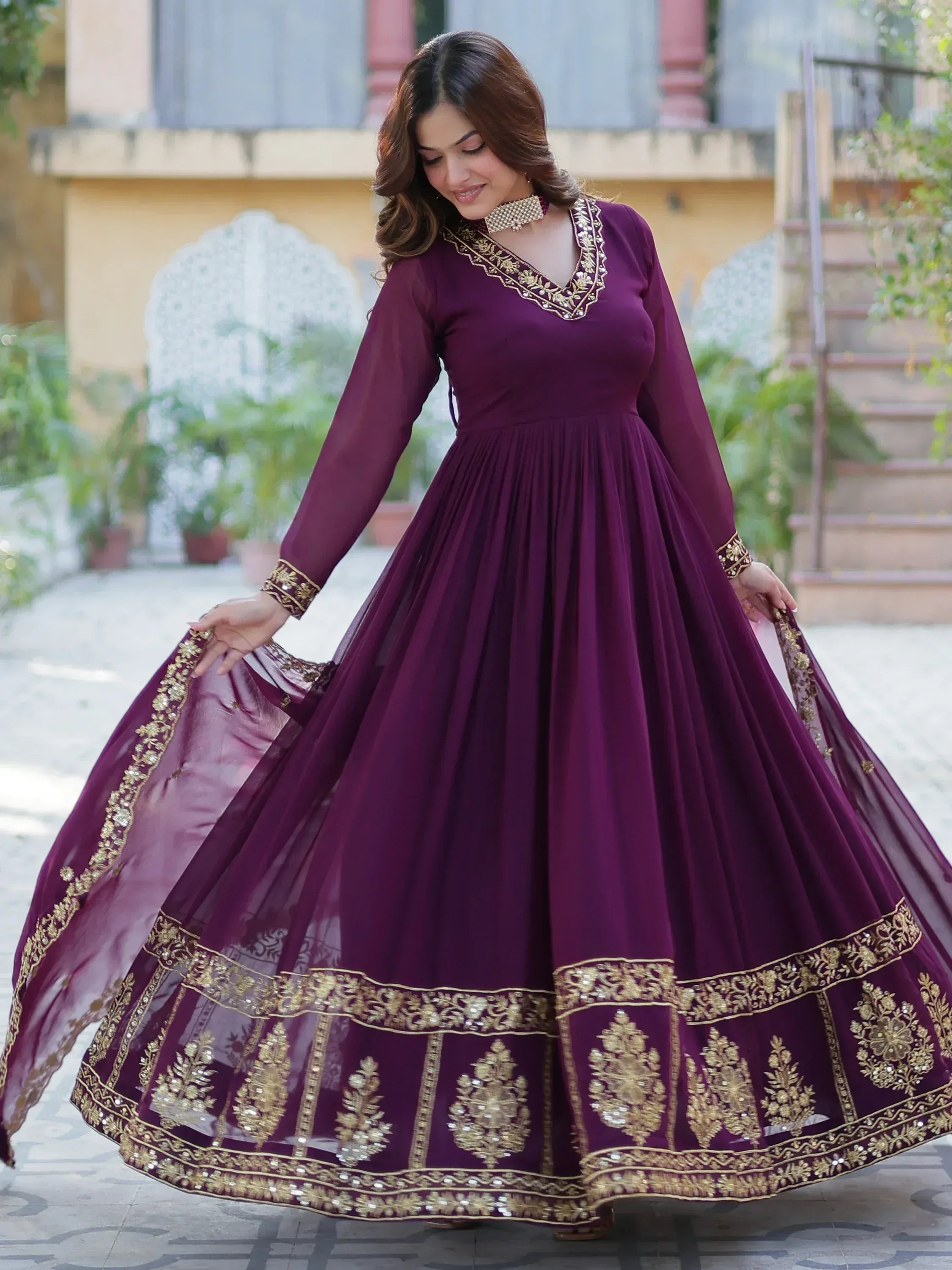 Elegant purple anarkali gown with gold embroidery, perfect for Indian ethnic occasions