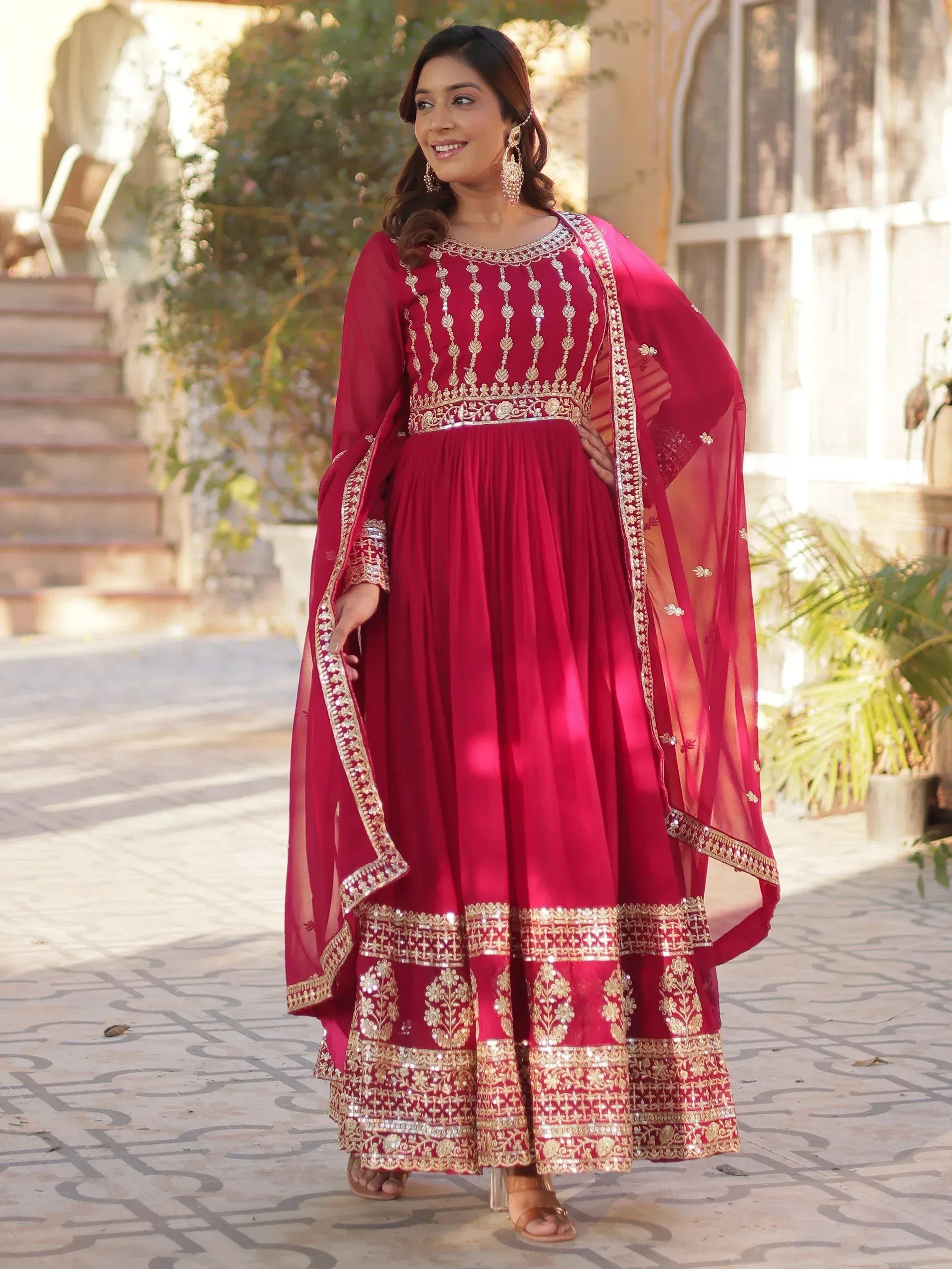 Elegant maroon anarkali with gold embroidery and dupatta, perfect for Indian ethnic occasions