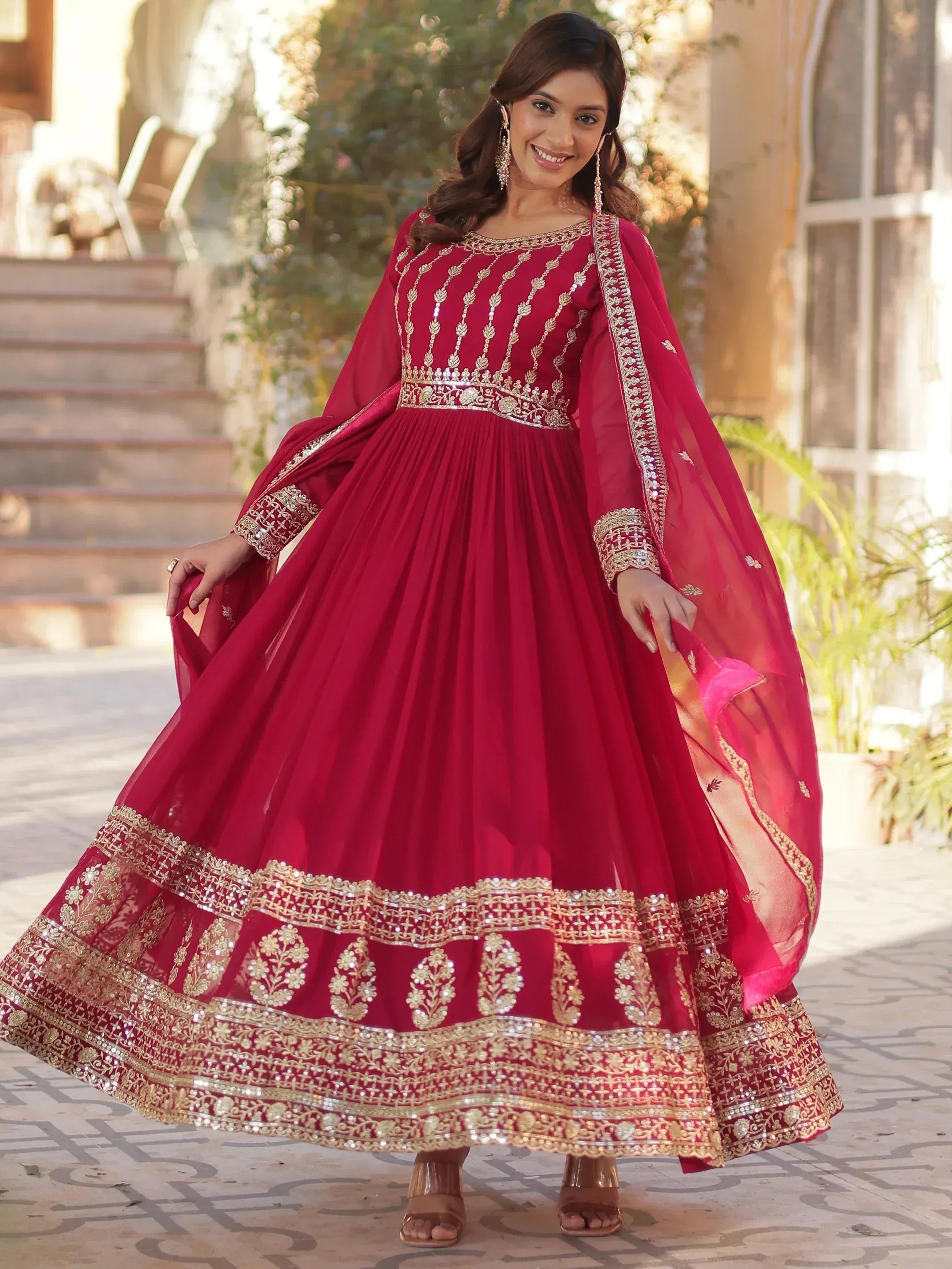 Elegant maroon anarkali with gold embroidery, perfect for Indian ethnic wear occasions