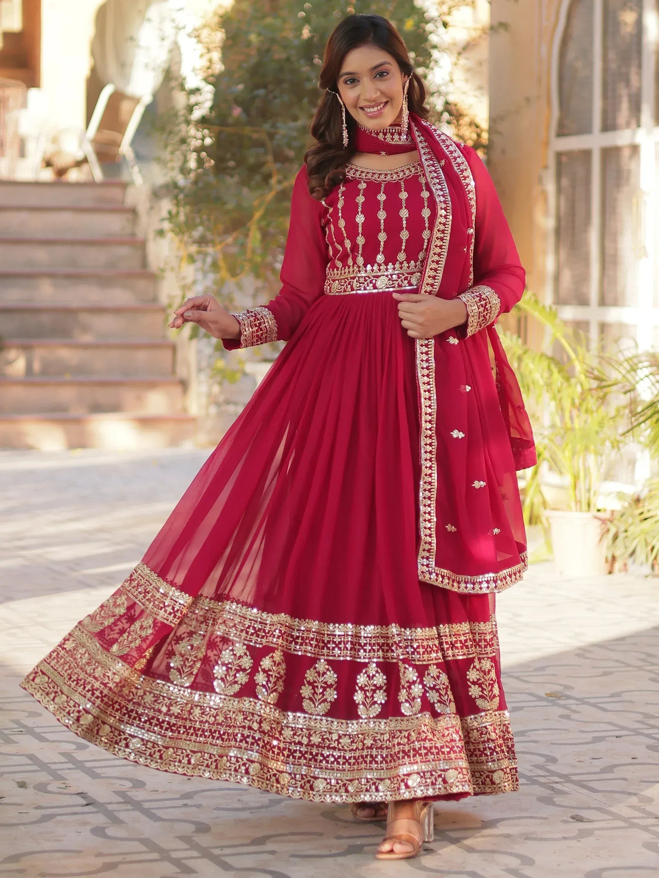 Red embroidered anarkali suit with gold detailing, perfect for Indian ethnic wear and festive occasions