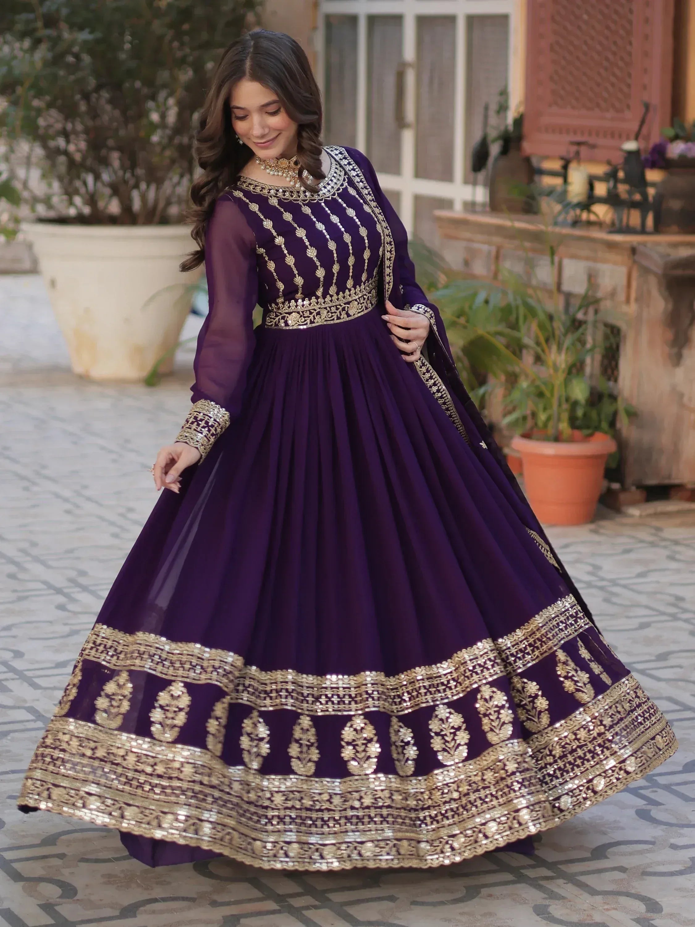 Purple ethnic anarkali with gold embroidery, perfect for Indian weddings and festive occasions