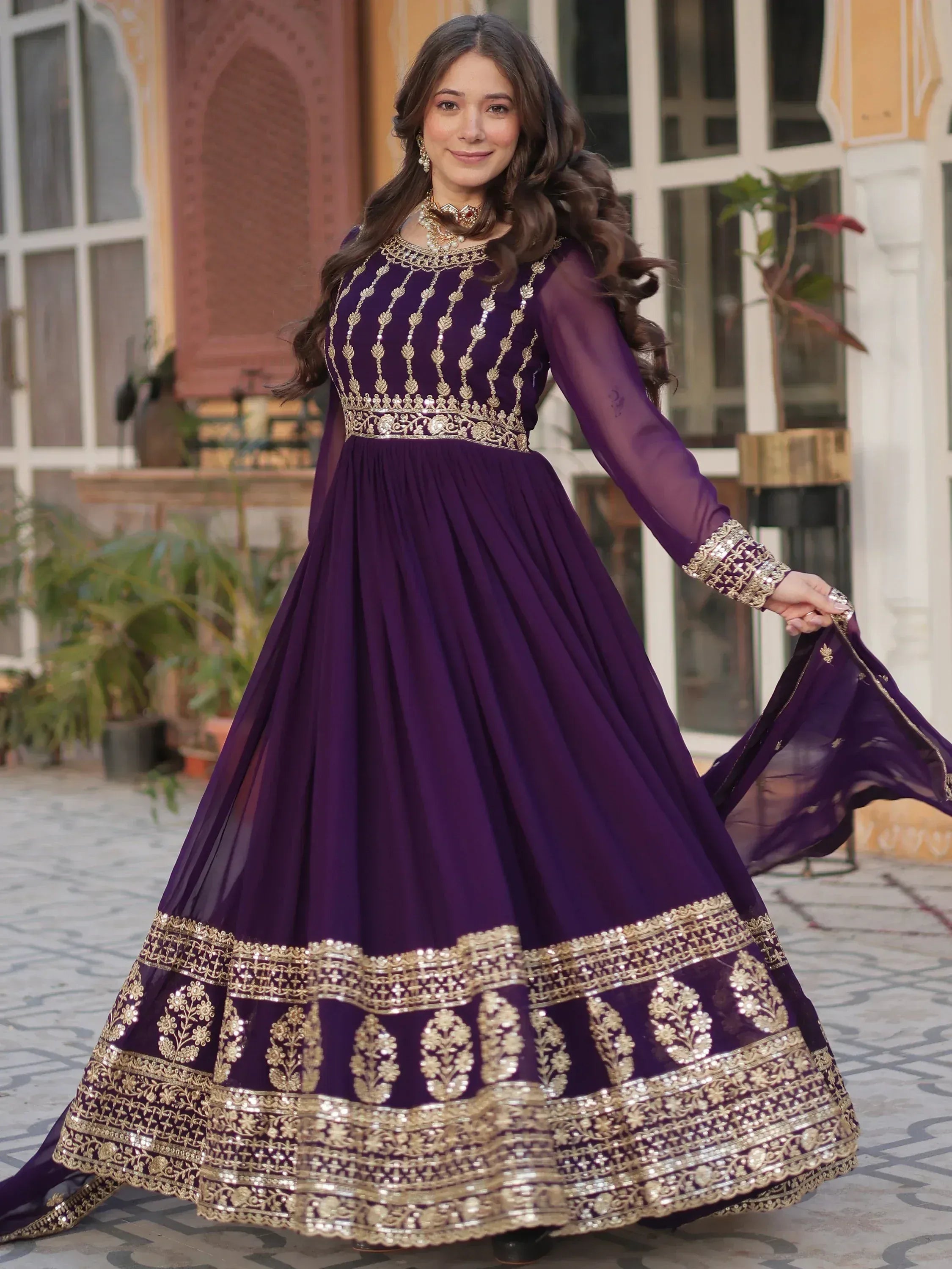 Elegant purple anarkali with gold embroidery, perfect for Indian ethnic wear and festive occasions.