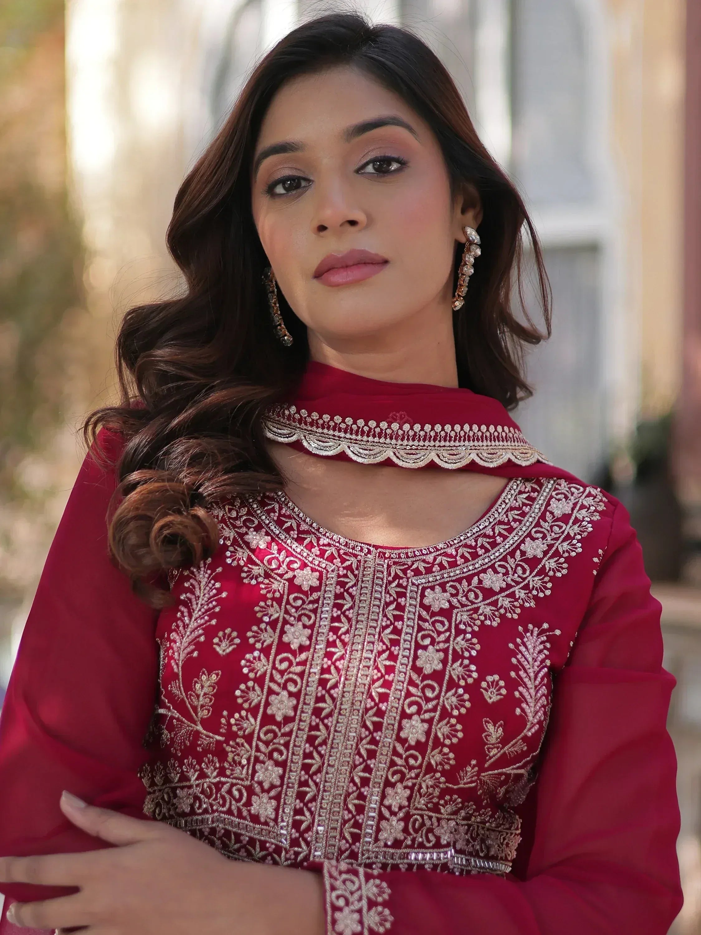 Elegant maroon ethnic kurti with intricate gold embroidery and matching dupatta