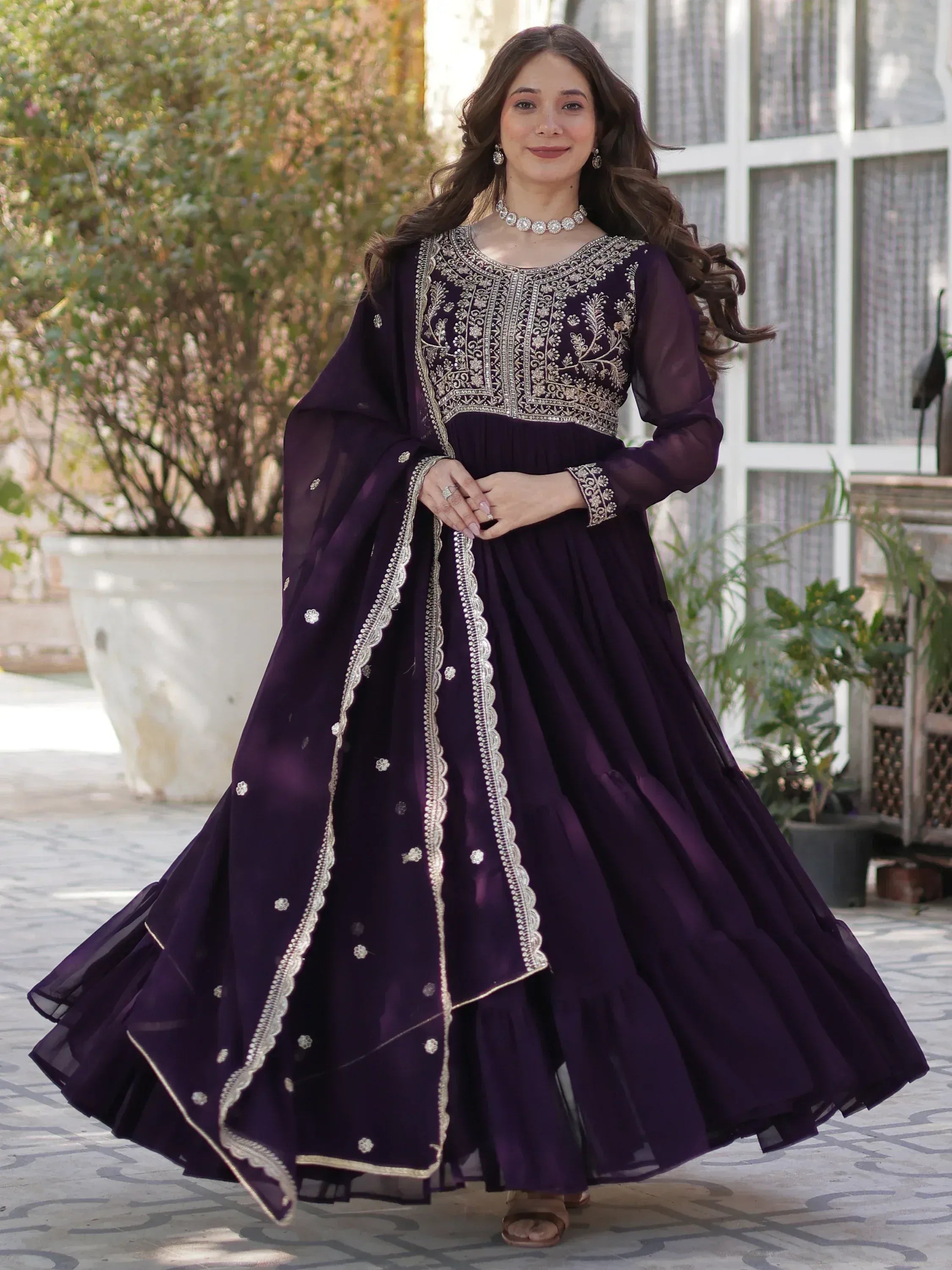 Elegant purple anarkali suit with silver embroidery, perfect for Indian ethnic wear and festive occasions.