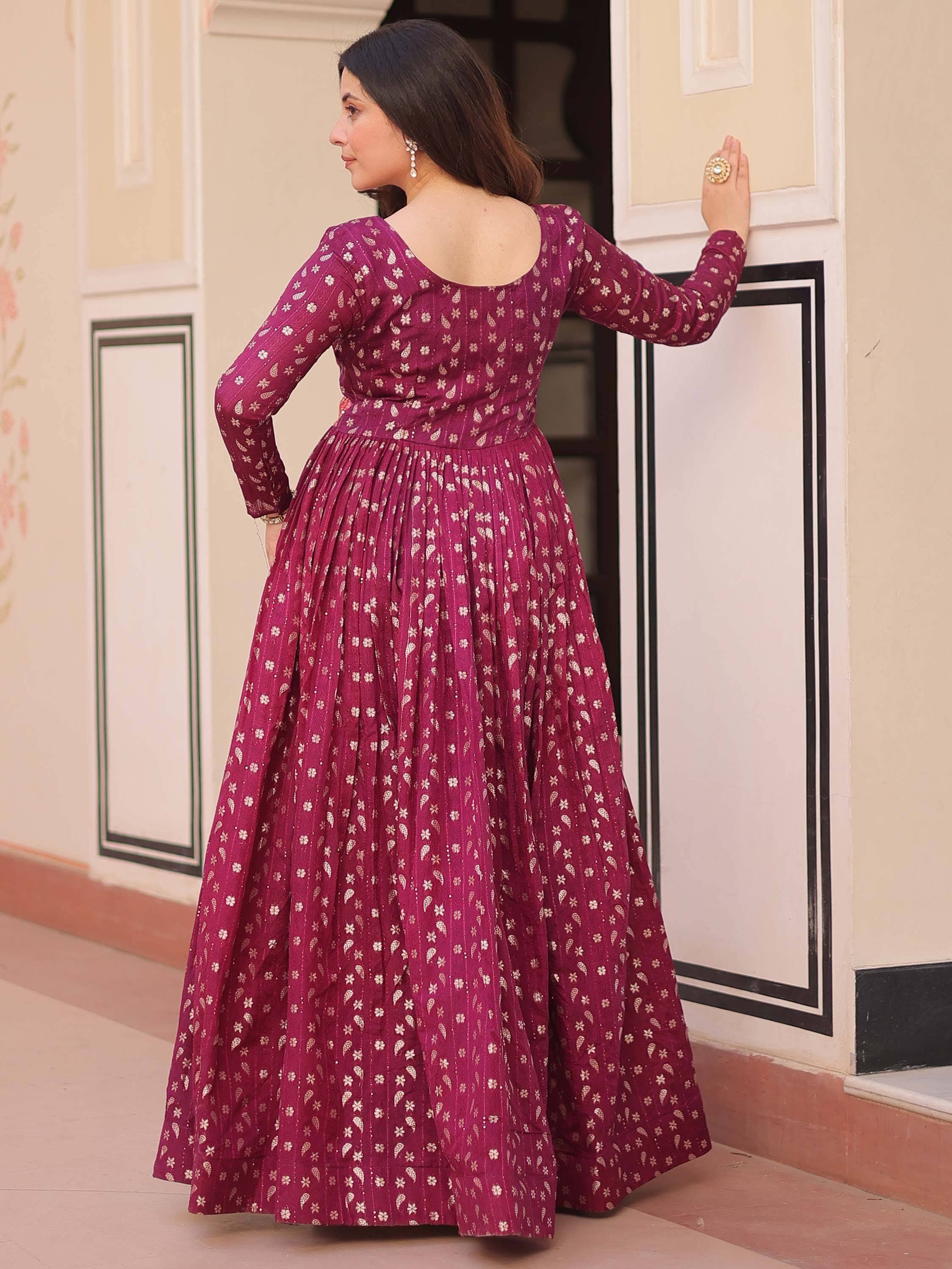 Maroon ethnic gown with floral print, long sleeves, and pleated skirt for Indian wear