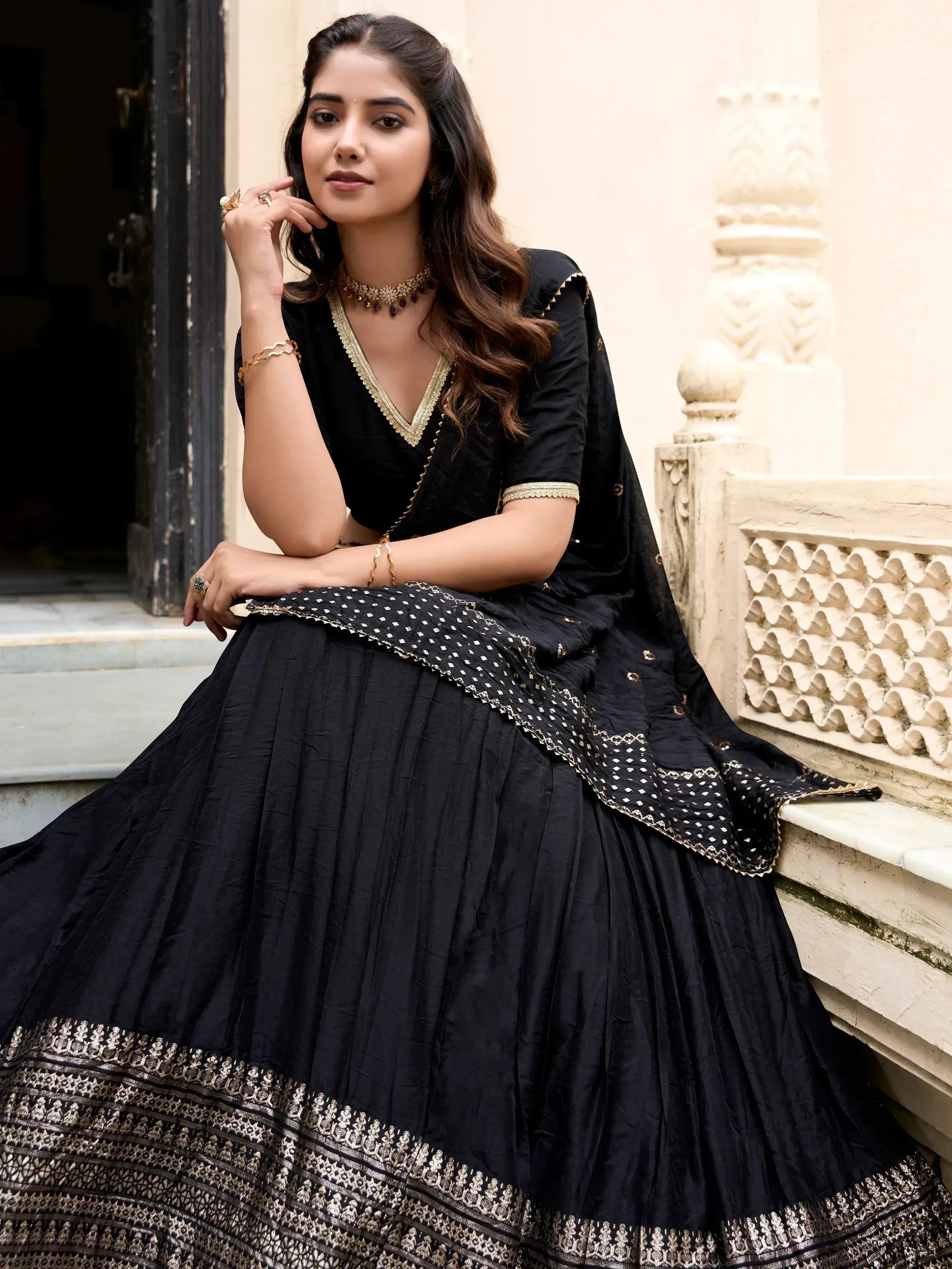 Black designer lehenga choli with gold embroidery, ethnic Indian wear for women