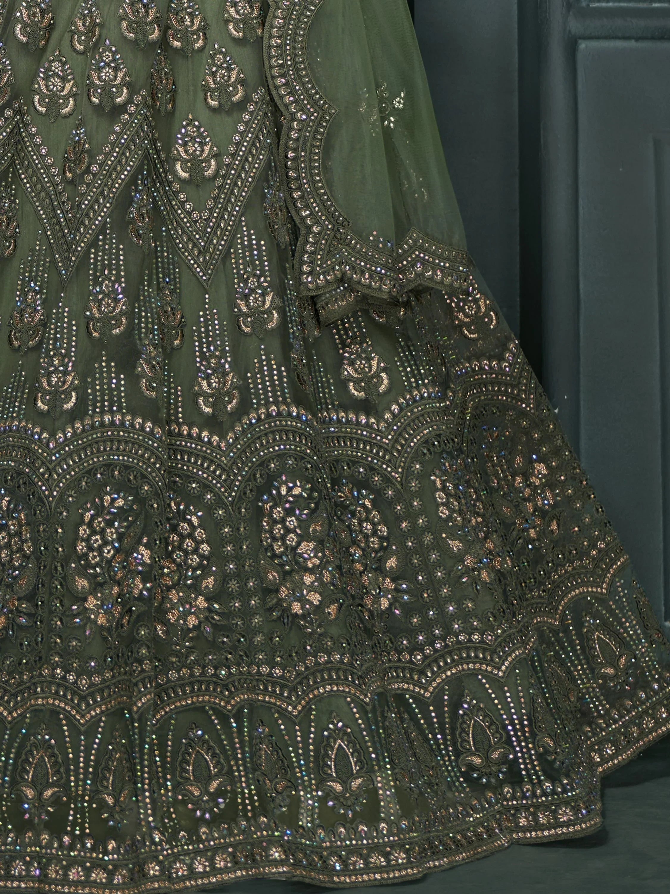 Olive green designer lehenga with intricate gold embroidery and sequin work for Indian ethnic wear
