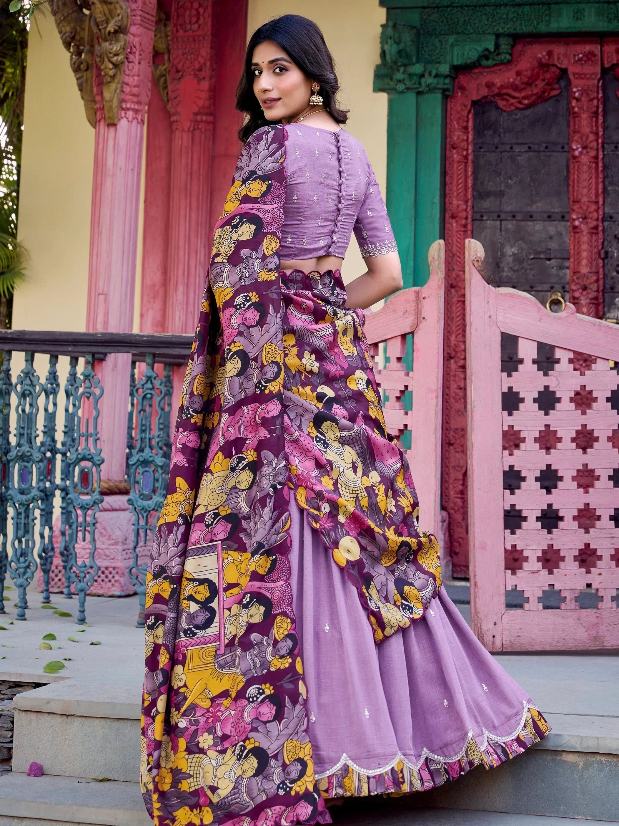 Purple printed lehenga choli with ethnic artwork, perfect for Indian festive occasions and weddings