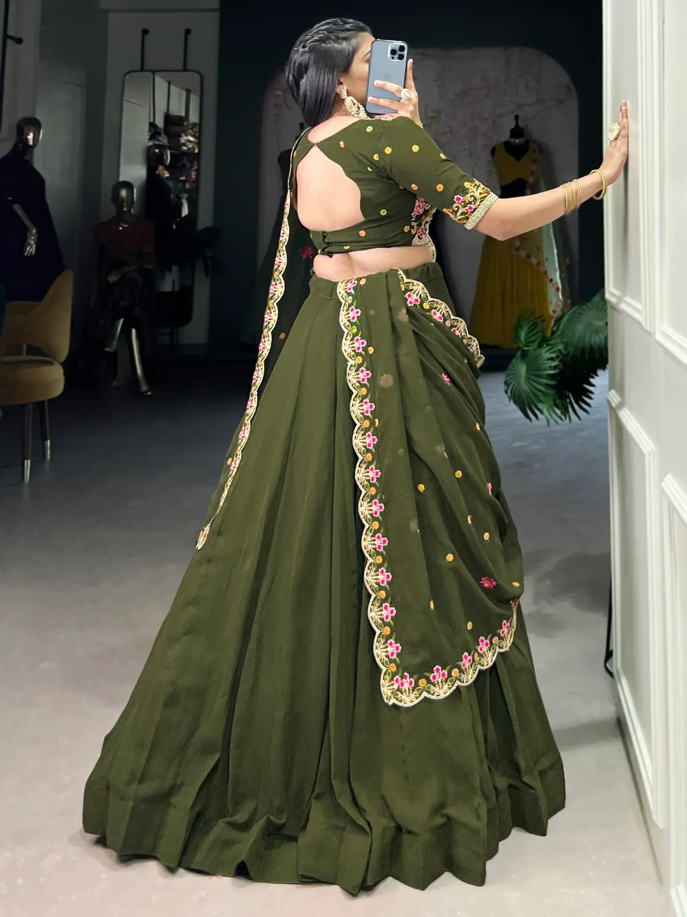 Olive green embroidered lehenga choli with floral detailing, backless blouse, perfect for Indian ethnic occasions
