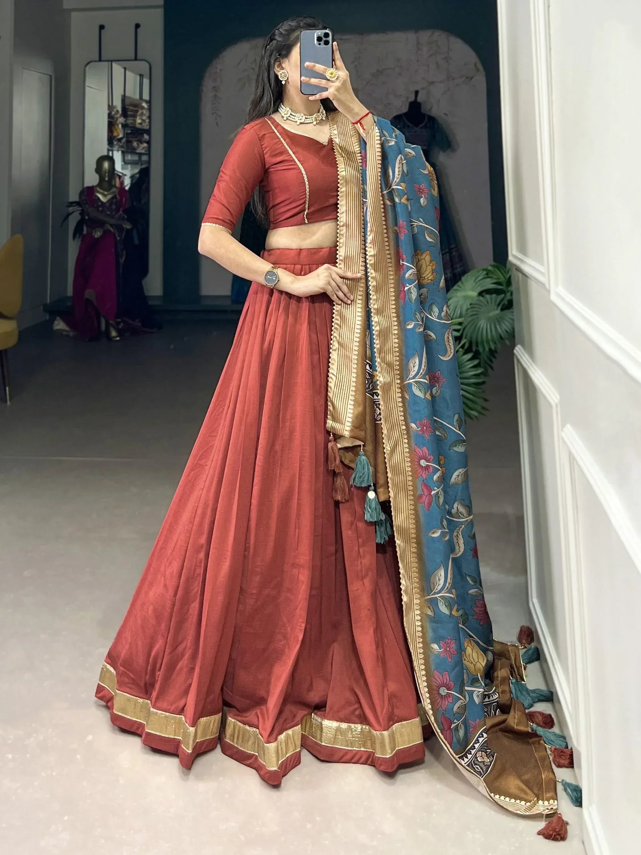 Red lehenga choli with gold trim and floral blue dupatta, Indian ethnic wear for women