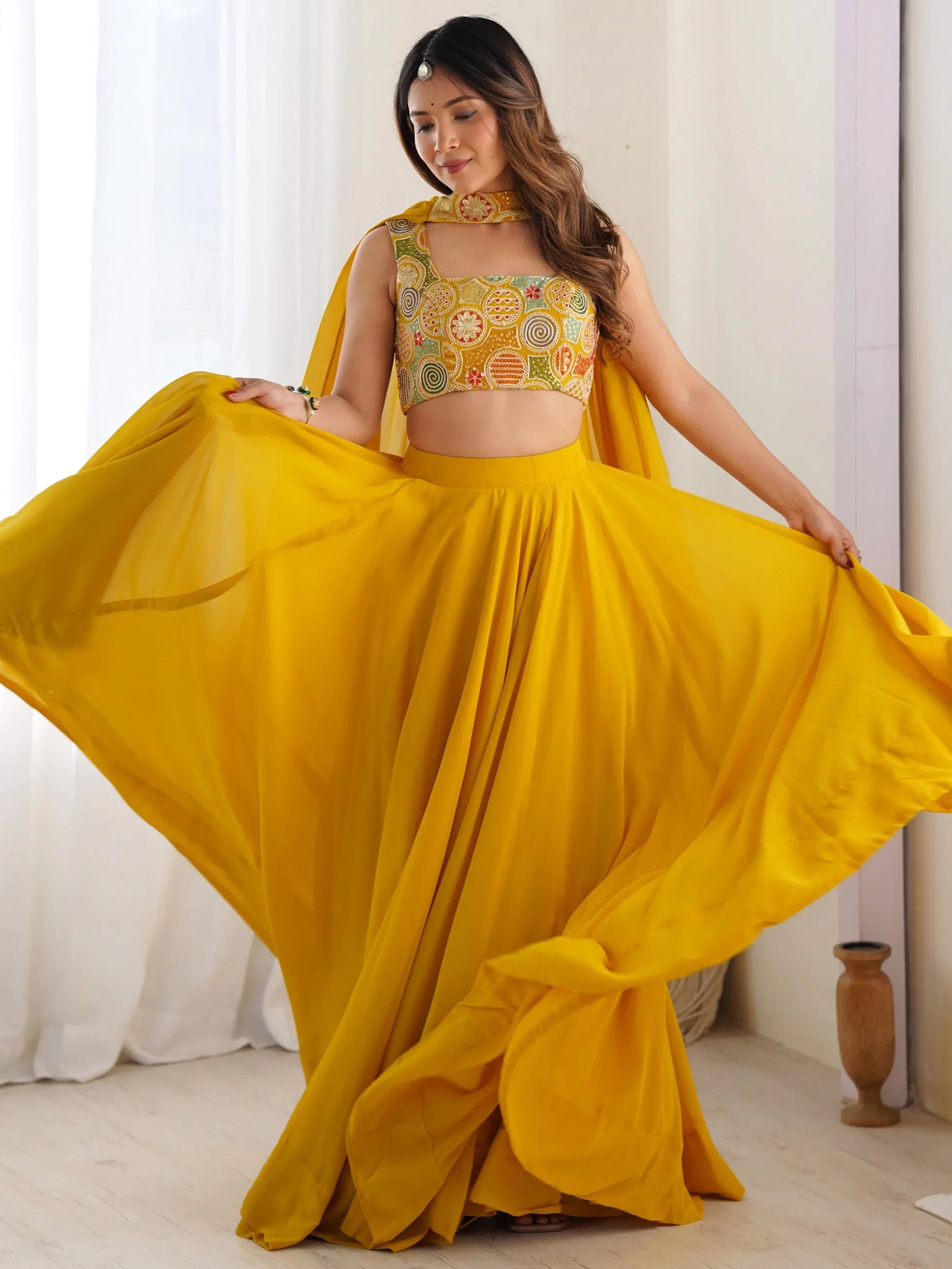 Magnetic Yellow Georgette Haldi Wear Lehenga Choli With Dupatta - Ethnic Plus In