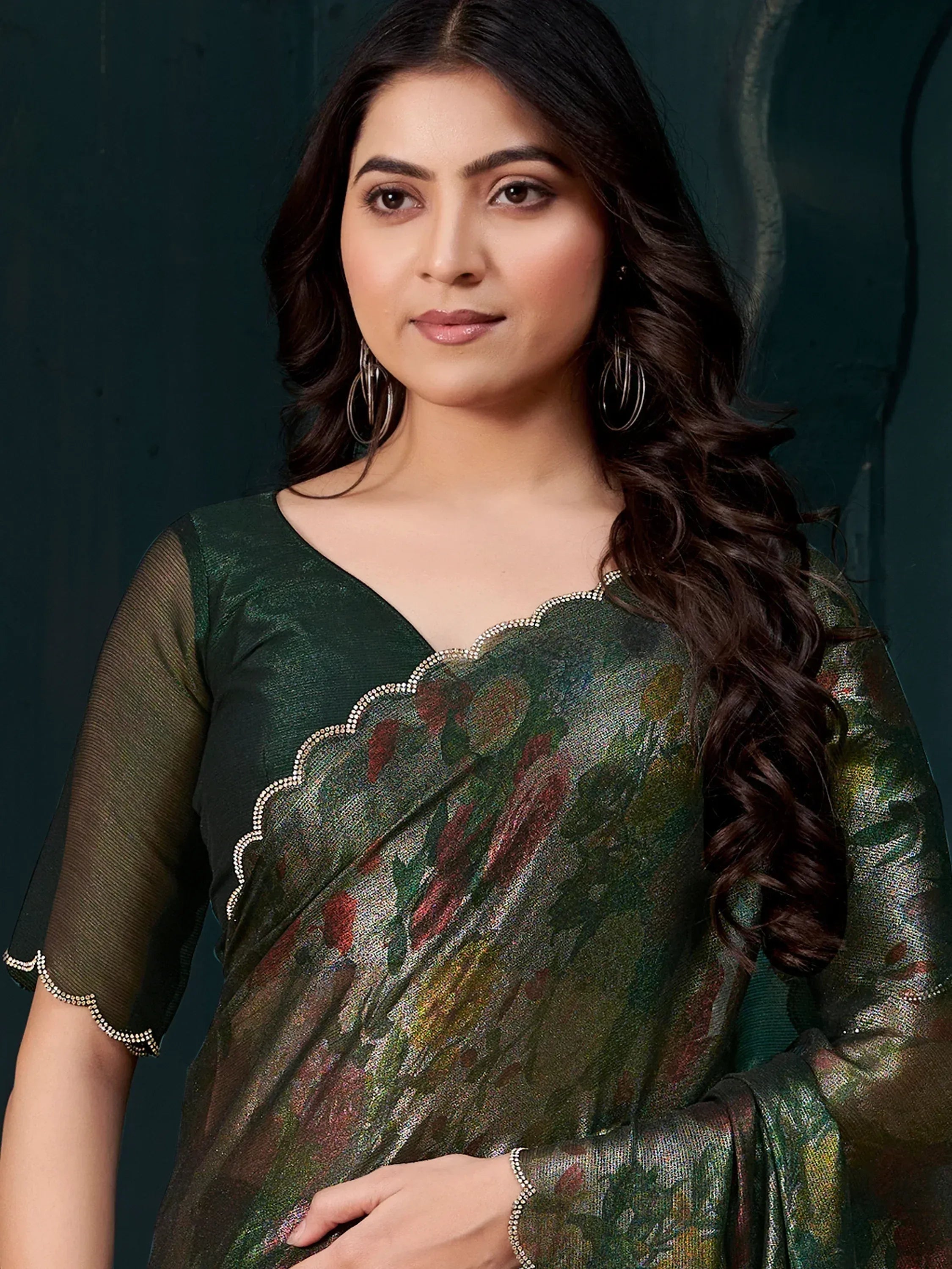 Elegant green floral saree with sequin border, perfect for Indian ethnic occasions