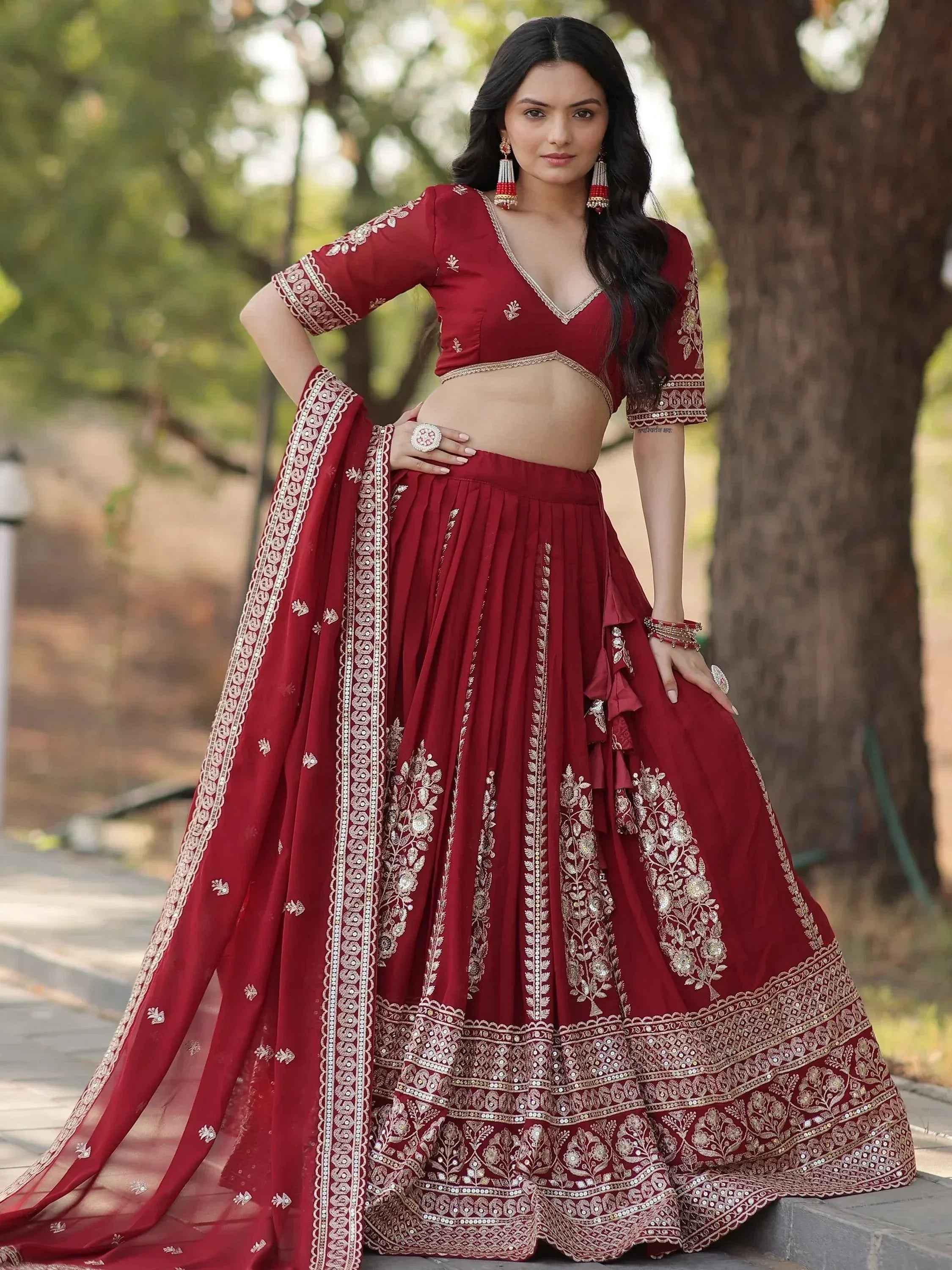 Maroon designer lehenga choli with gold embroidery, perfect for Indian ethnic wear occasions