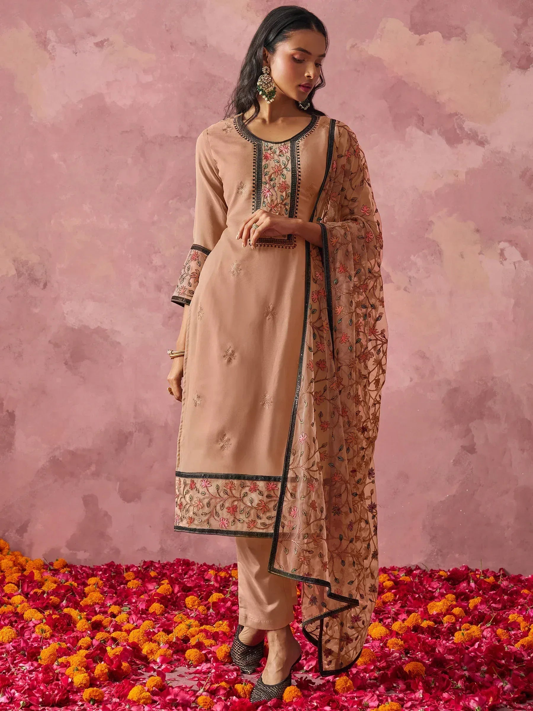Elegant beige embroidered salwar kameez with floral dupatta, perfect for Indian ethnic wear occasions