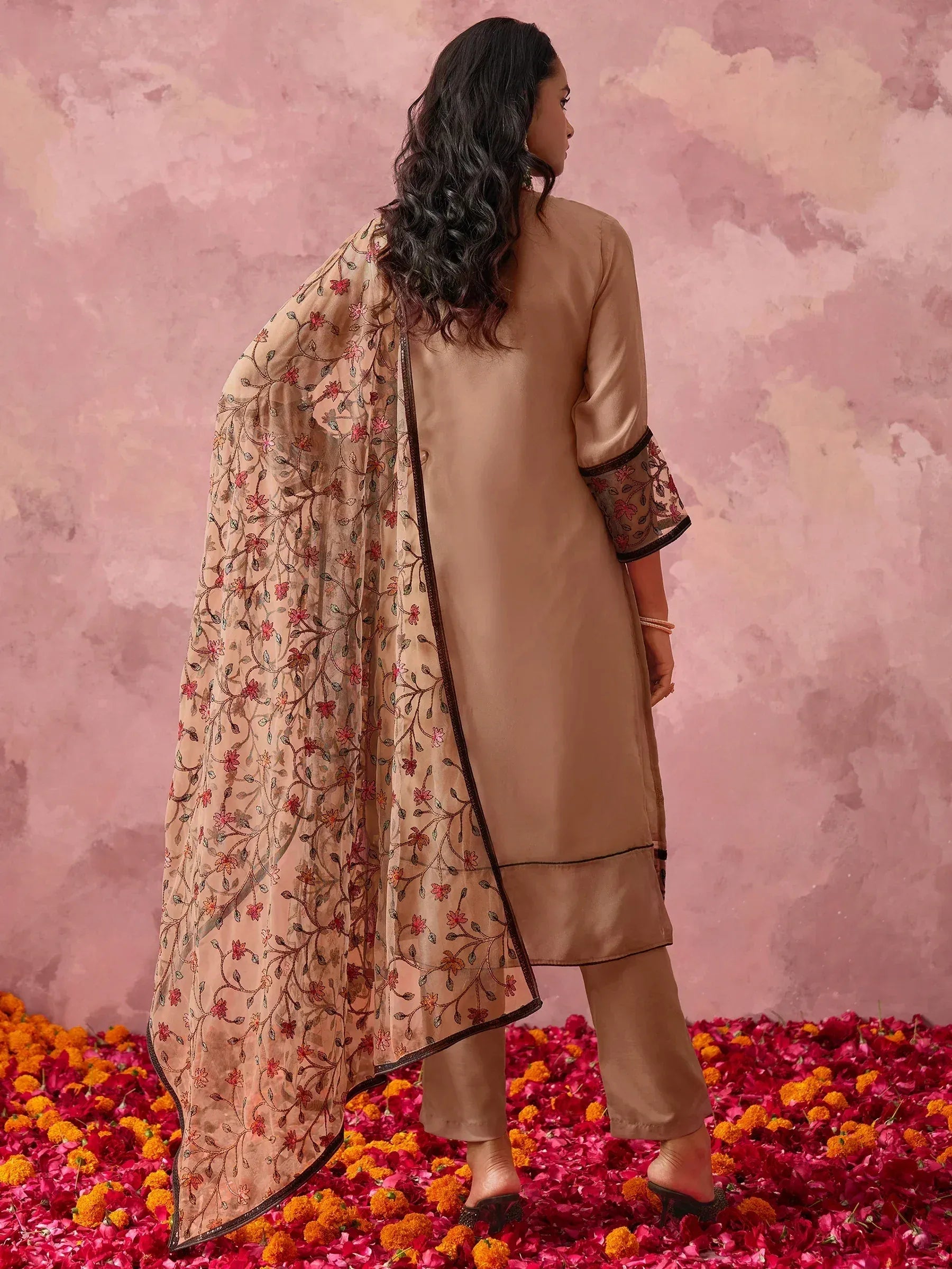 Beige embroidered salwar kameez with floral dupatta, perfect for Indian ethnic wear occasions.