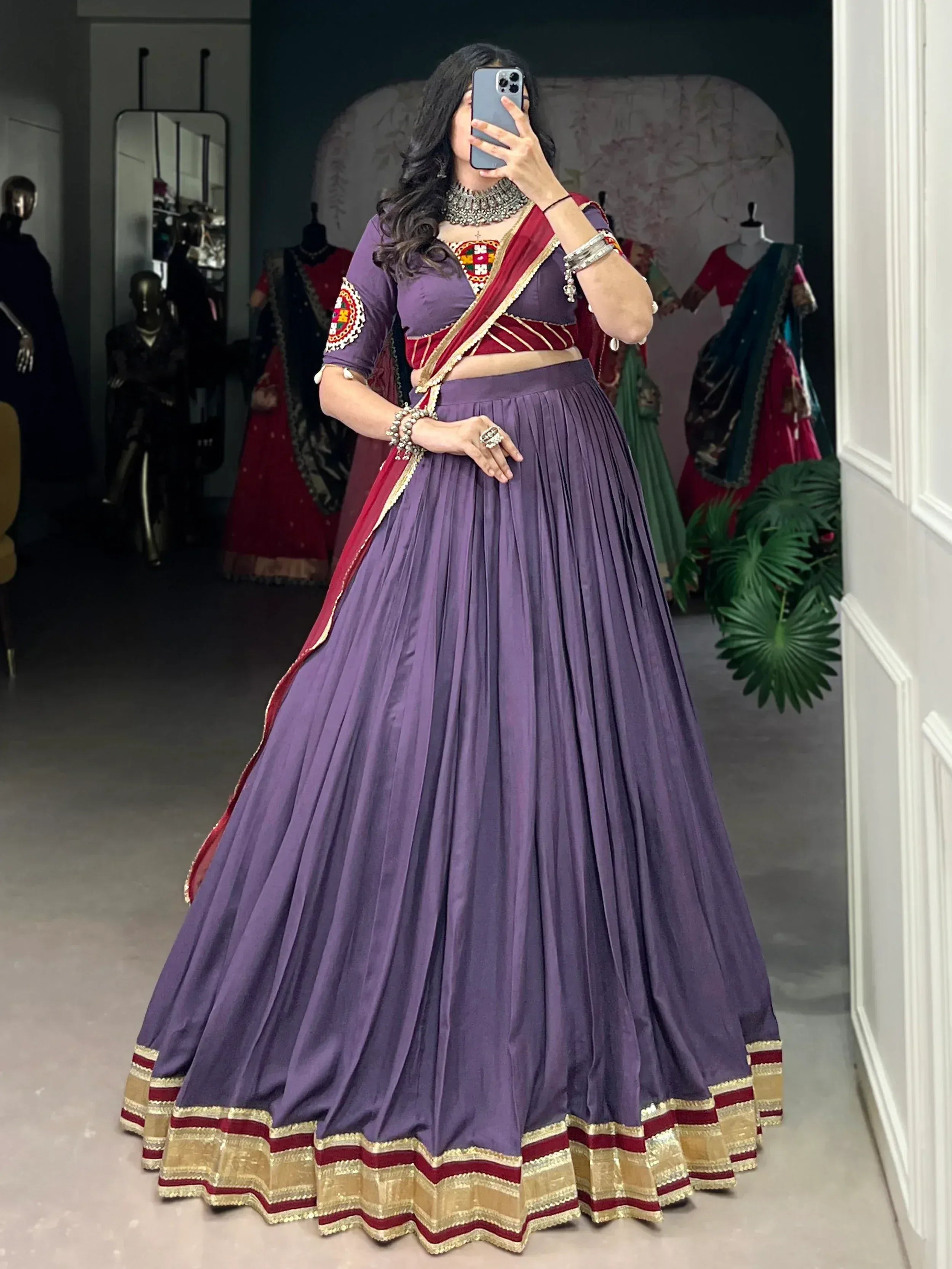 Purple lehenga choli with red and gold dupatta, ethnic Indian wear for weddings and festivals
