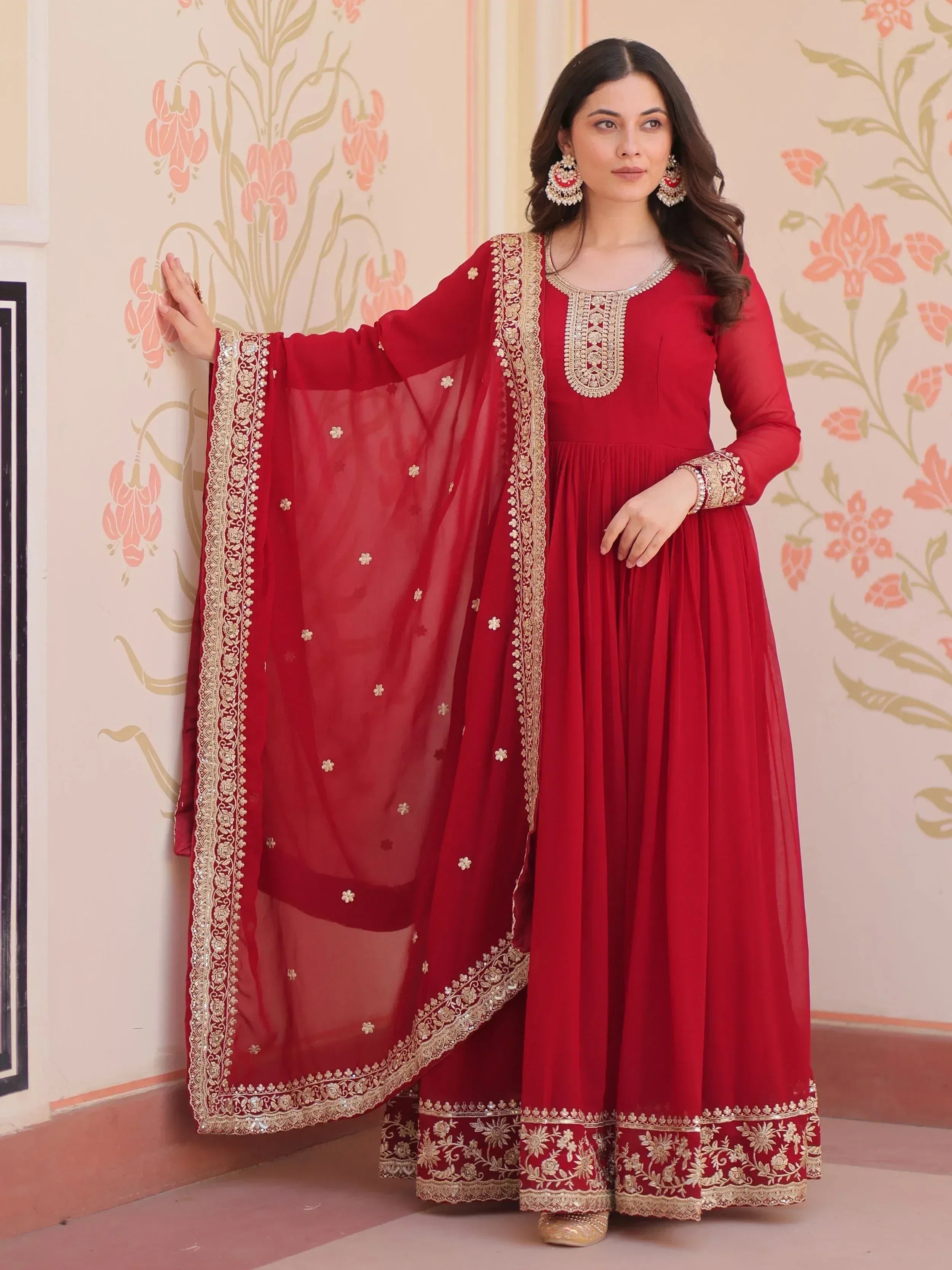 Red ethnic anarkali suit with gold embroidery and dupatta, perfect for Indian occasions