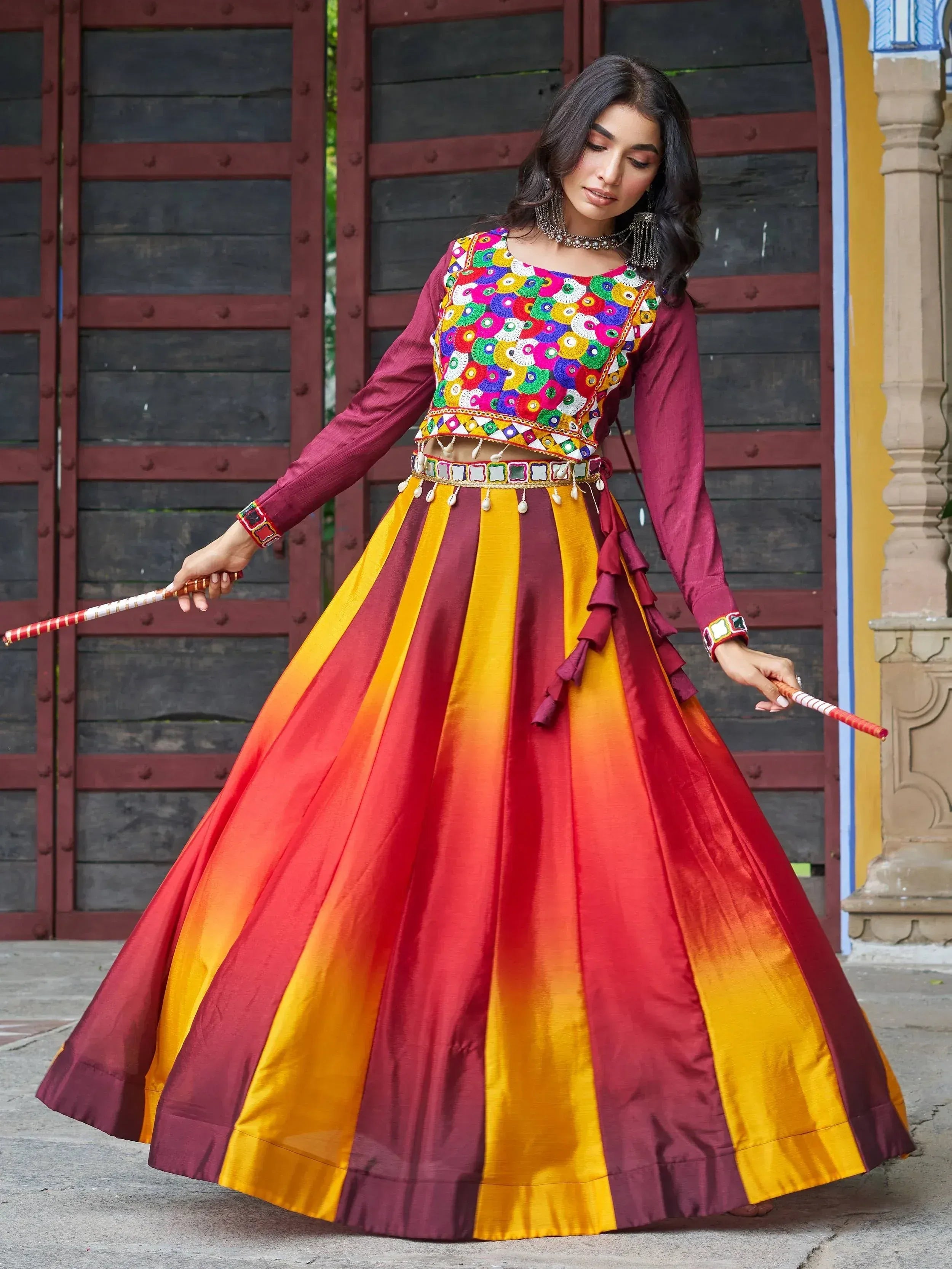 Colorful Indian ethnic lehenga choli with mirror work, perfect for festive occasions and traditional celebrations.