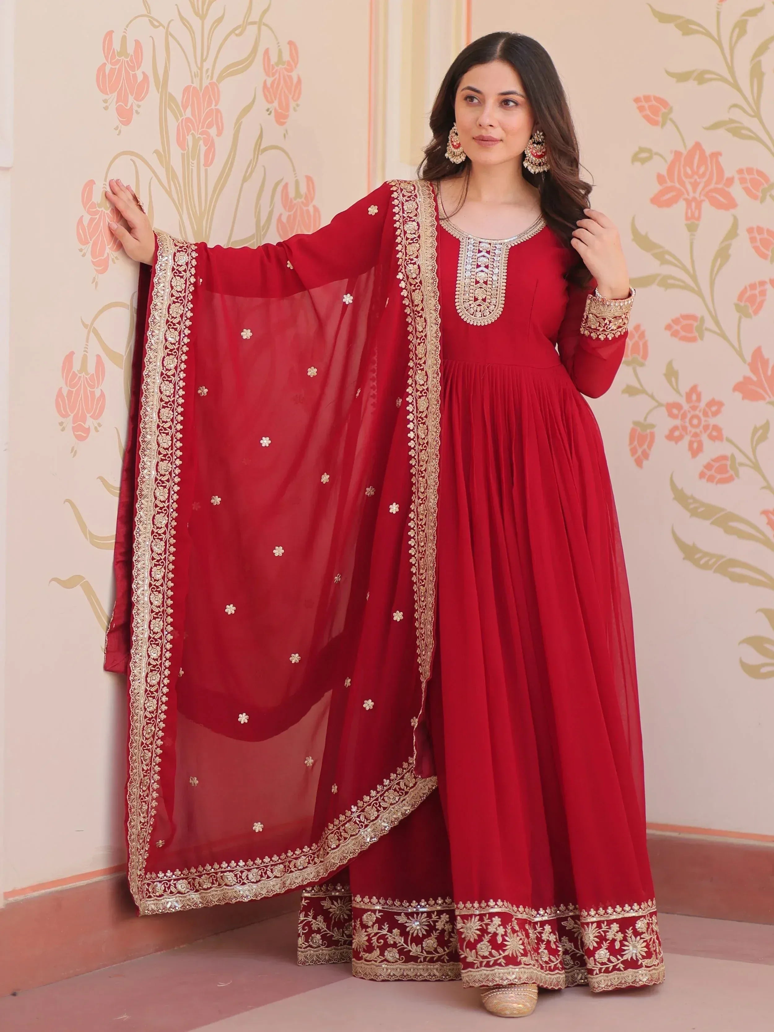 Red embroidered anarkali suit with gold detailing and matching dupatta, ideal for Indian ethnic occasions