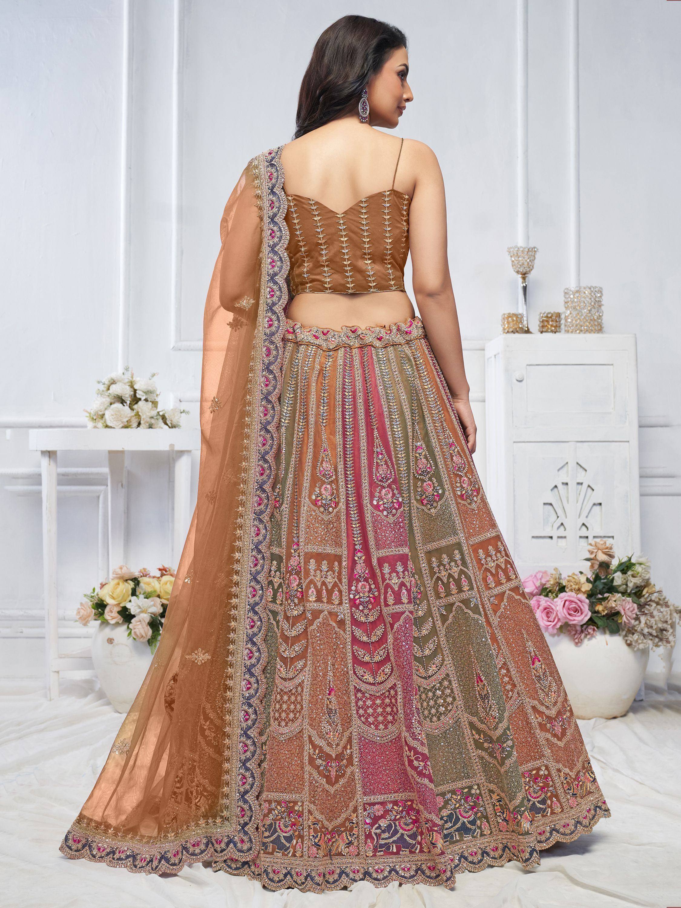 Designer lehenga choli with intricate embroidery, perfect for Indian weddings and festive occasions.