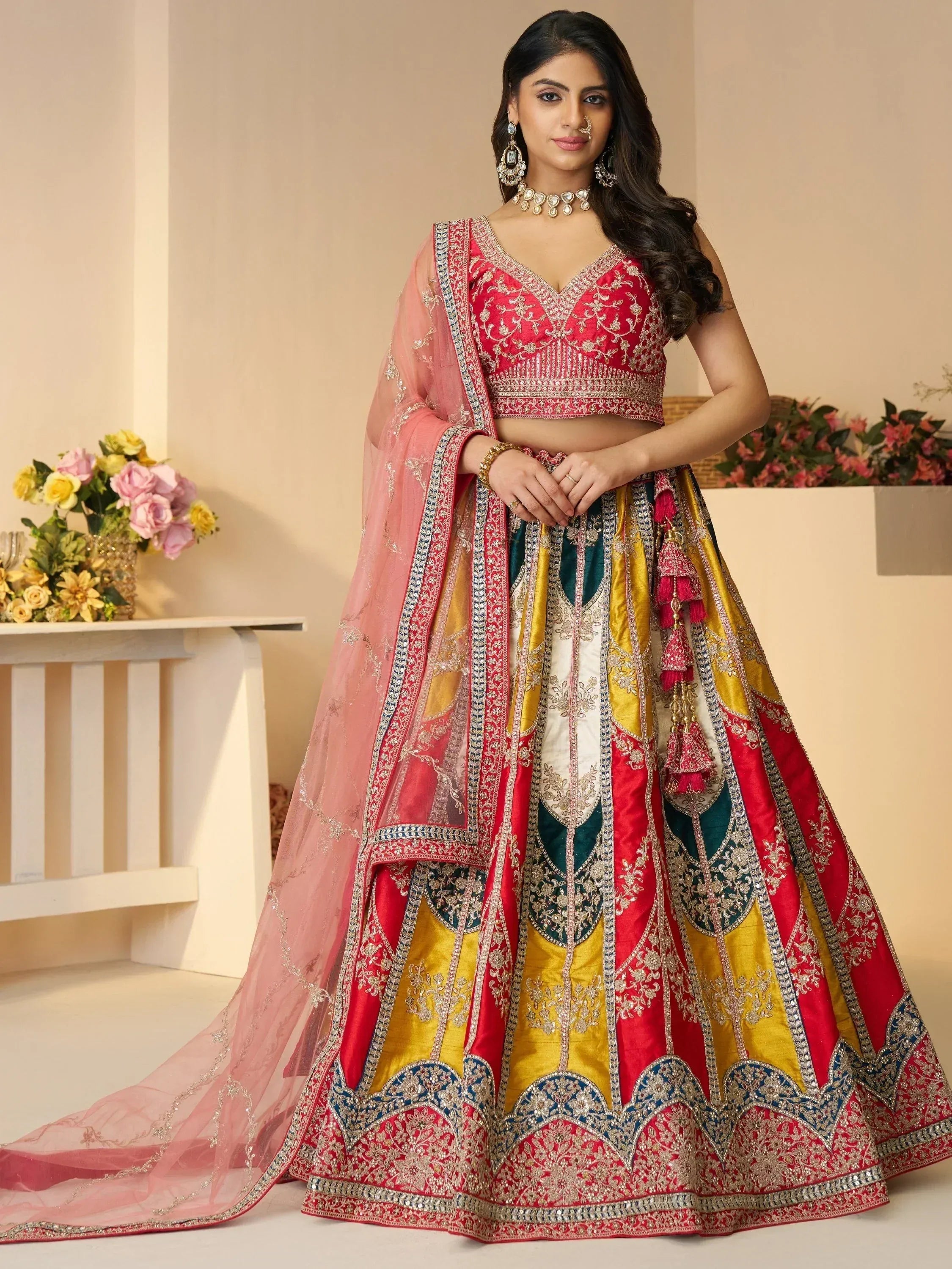 Red and gold embroidered lehenga choli with pink dupatta, Indian ethnic wear for weddings