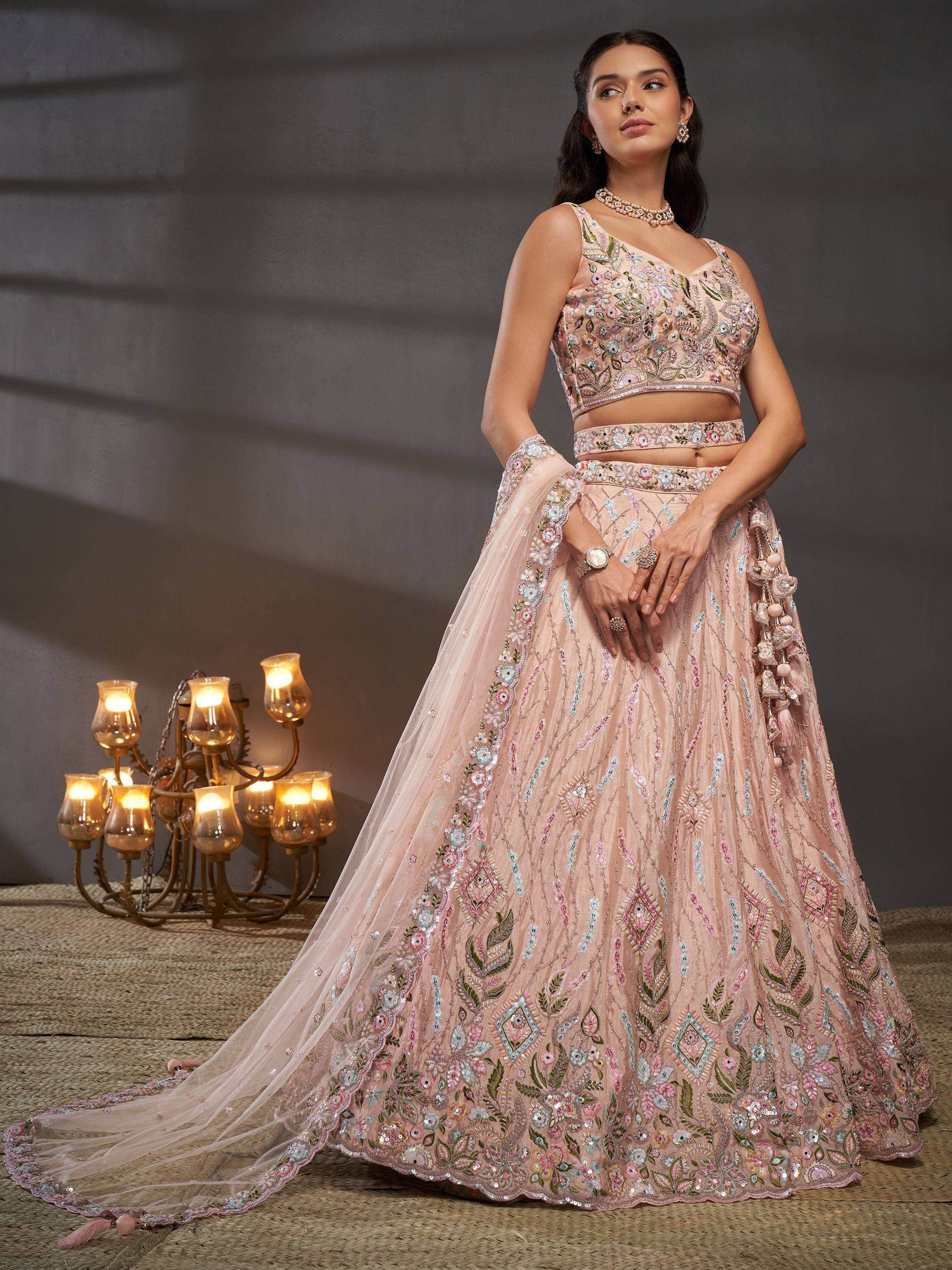 Pink floral embroidered lehenga choli with dupatta, perfect for Indian weddings and festive occasions