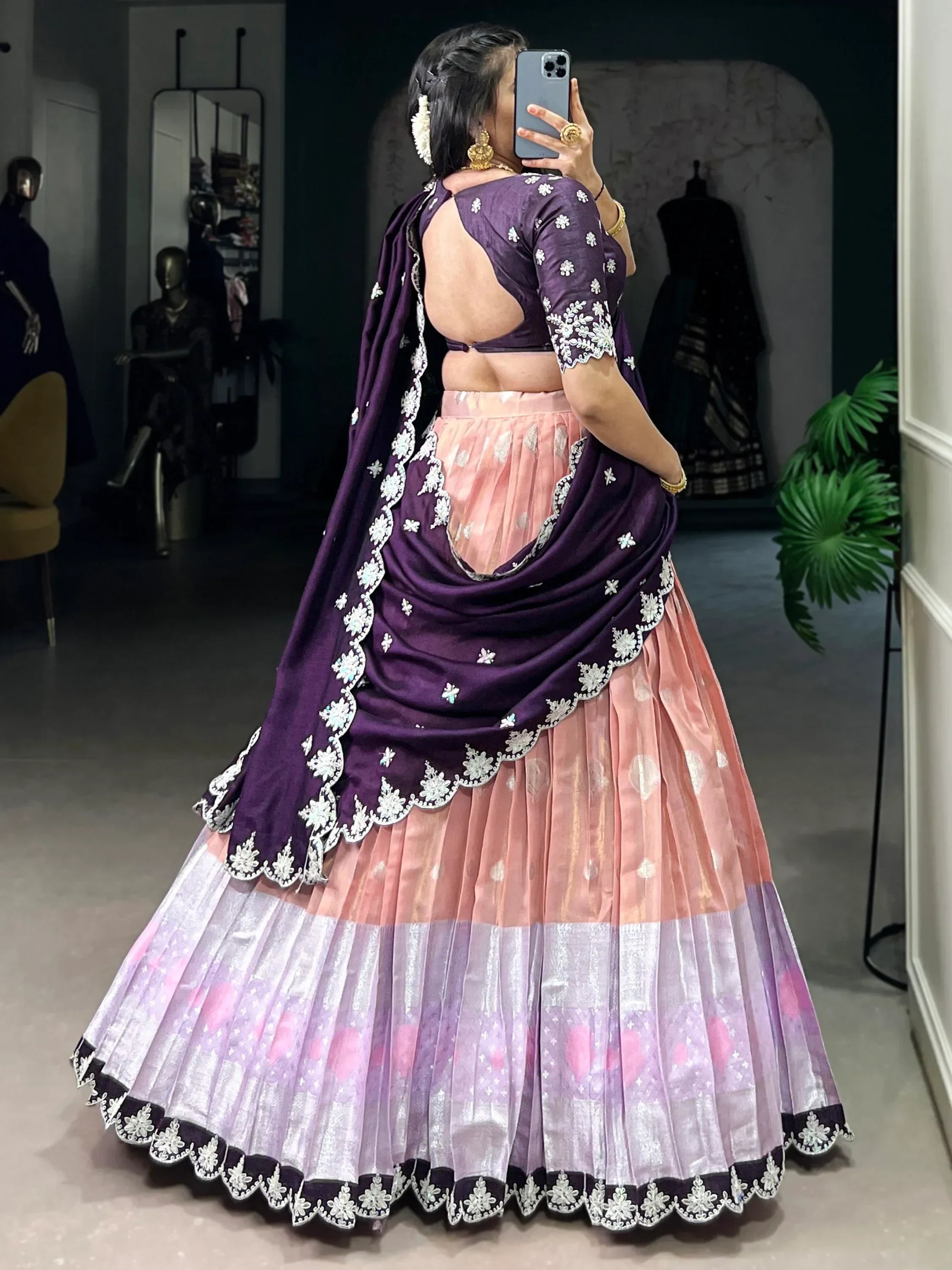 Purple and pink designer lehenga choli with floral embroidery, backless blouse, and pleated skirt for ethnic wear