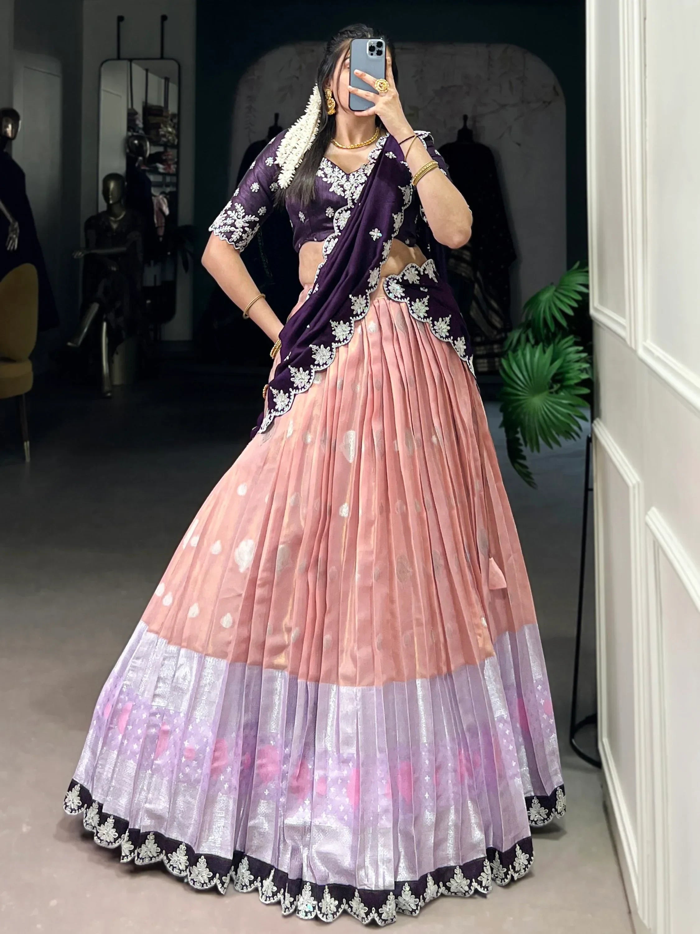 Purple and pink embroidered lehenga choli with floral dupatta, perfect for Indian ethnic occasions
