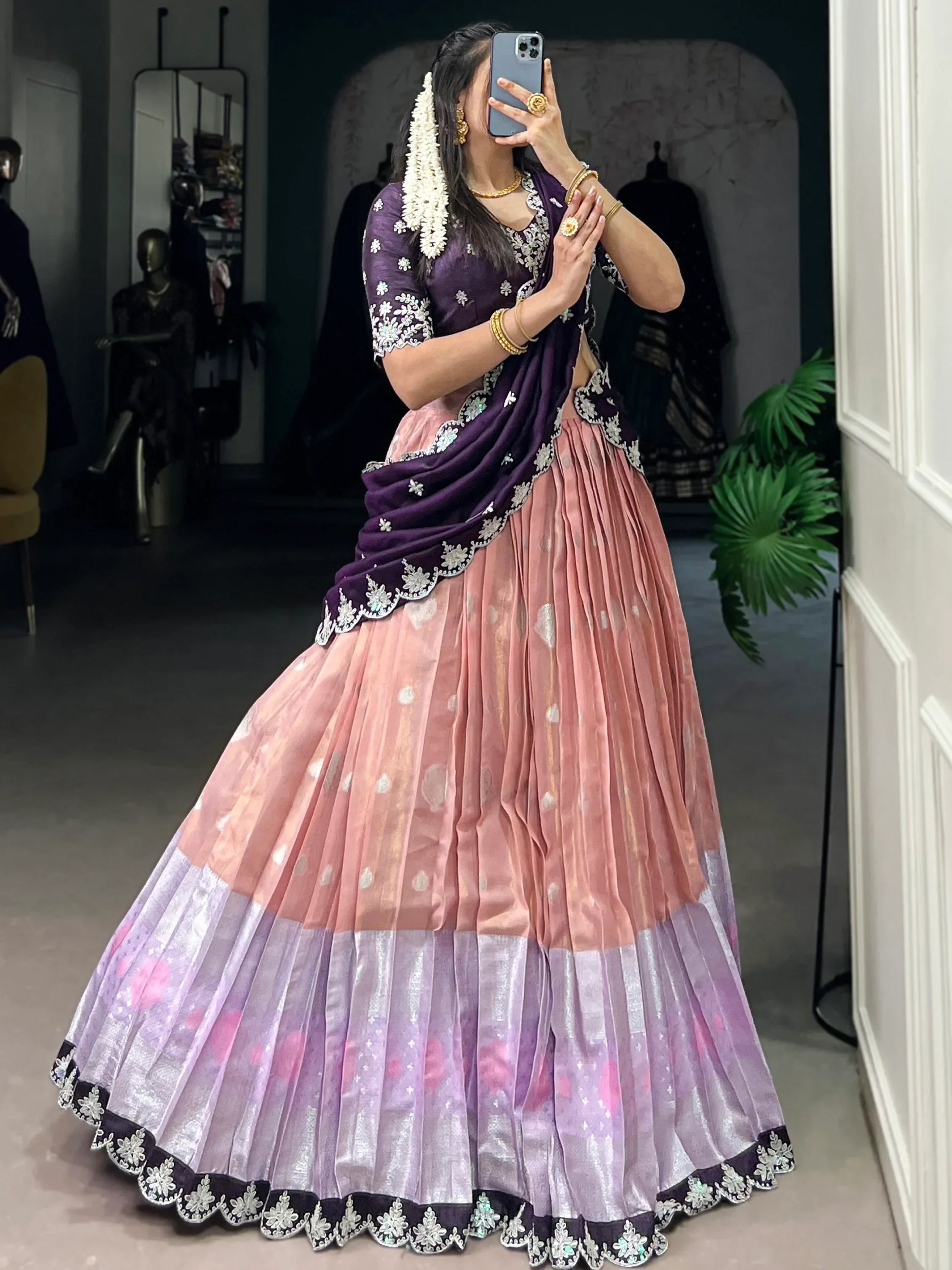Purple and pink embroidered lehenga choli with floral dupatta, perfect for Indian ethnic occasions