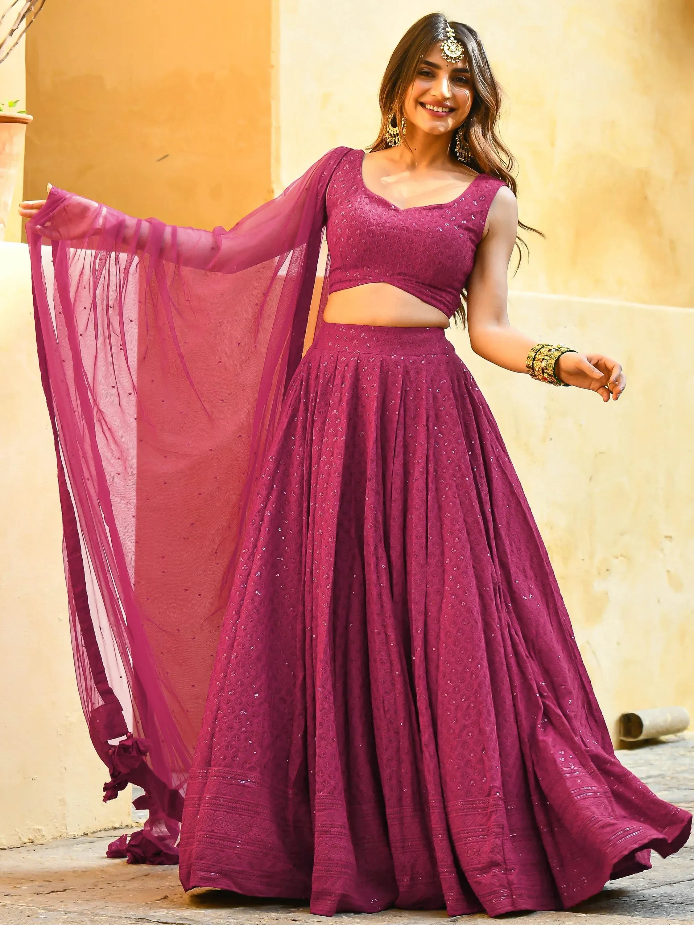 Purple embroidered lehenga choli with sheer dupatta, perfect for Indian ethnic wear and festive occasions