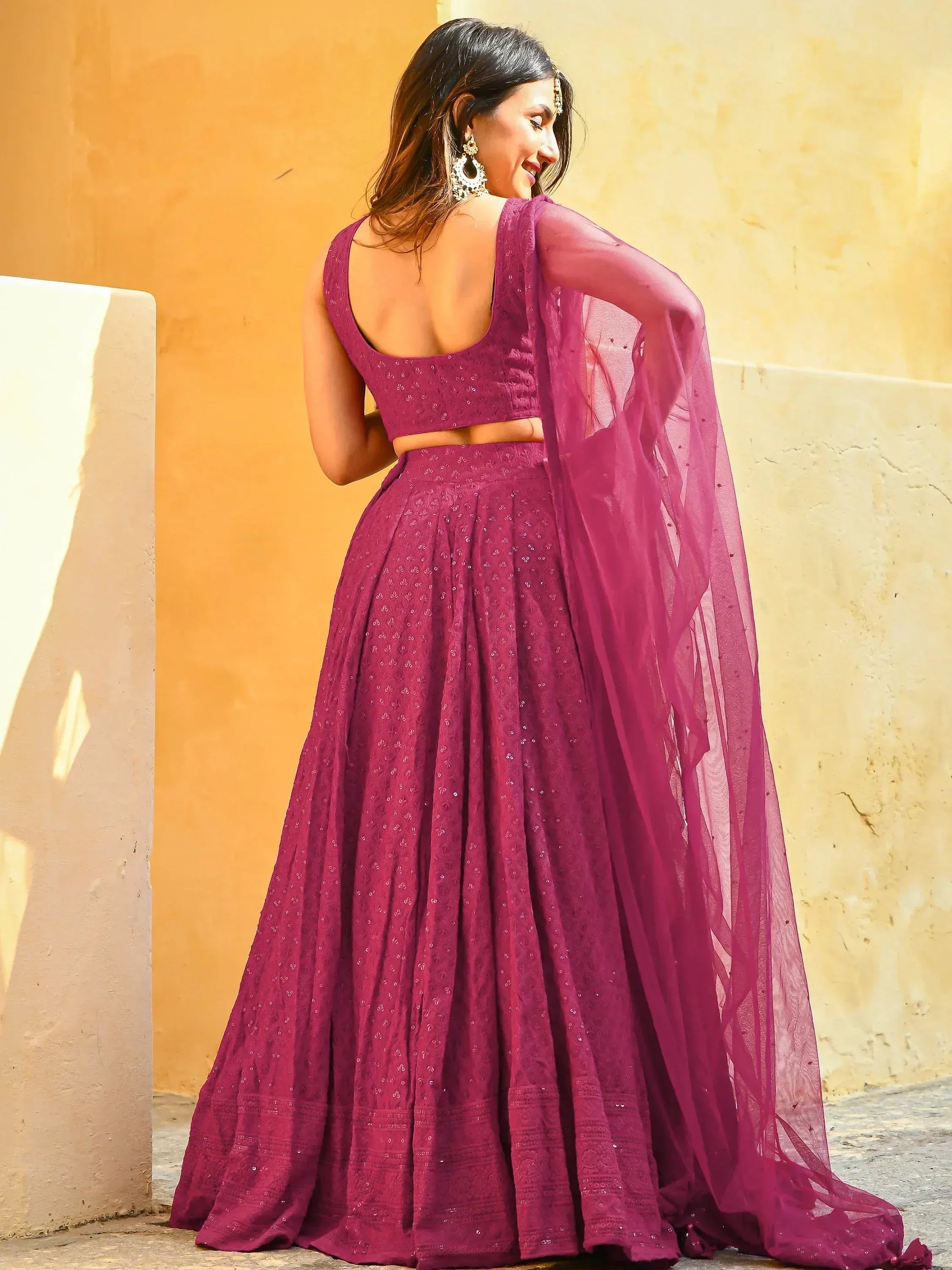 Purple designer lehenga choli with sheer dupatta, back view, ethnic wear for women