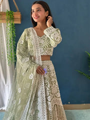 Marvelous Pista Green Pearl Work Net Engagement Wear Lehenga Choli - Ethnic Plus In