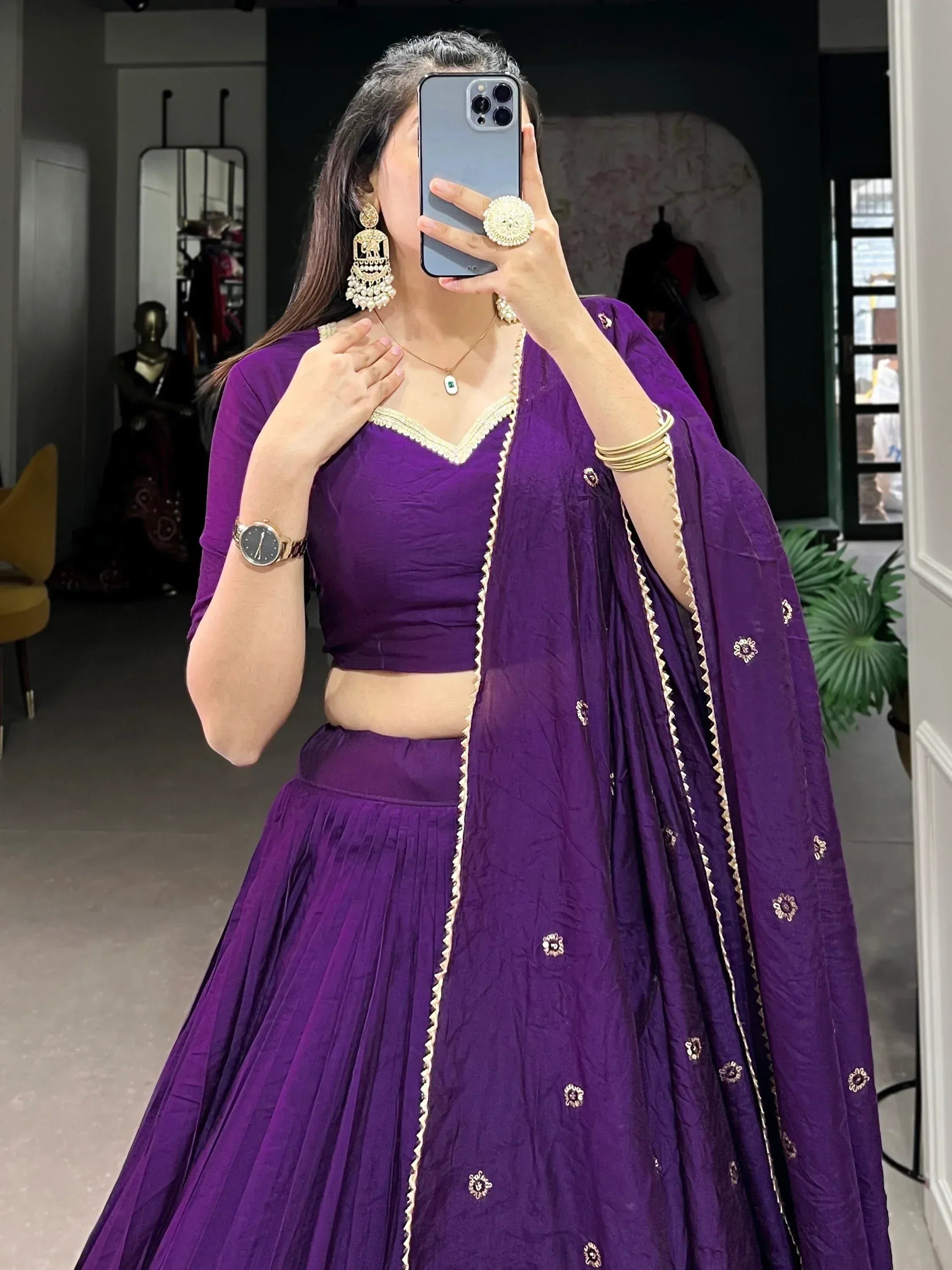 Purple lehenga choli with gold embroidery, perfect for Indian ethnic wear and festive occasions.