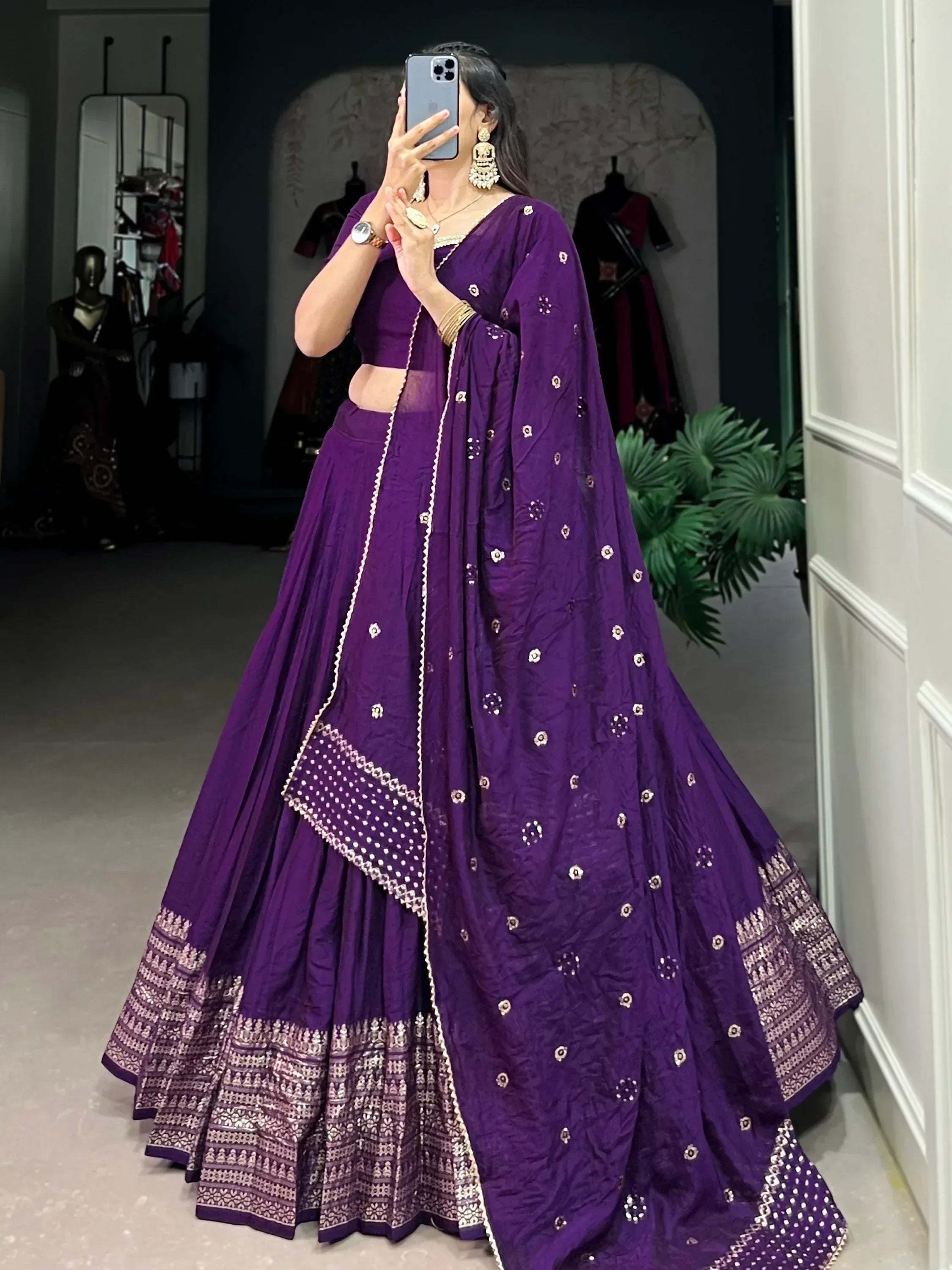 Purple designer lehenga choli with gold embroidery, perfect for Indian ethnic wear and festive occasions.