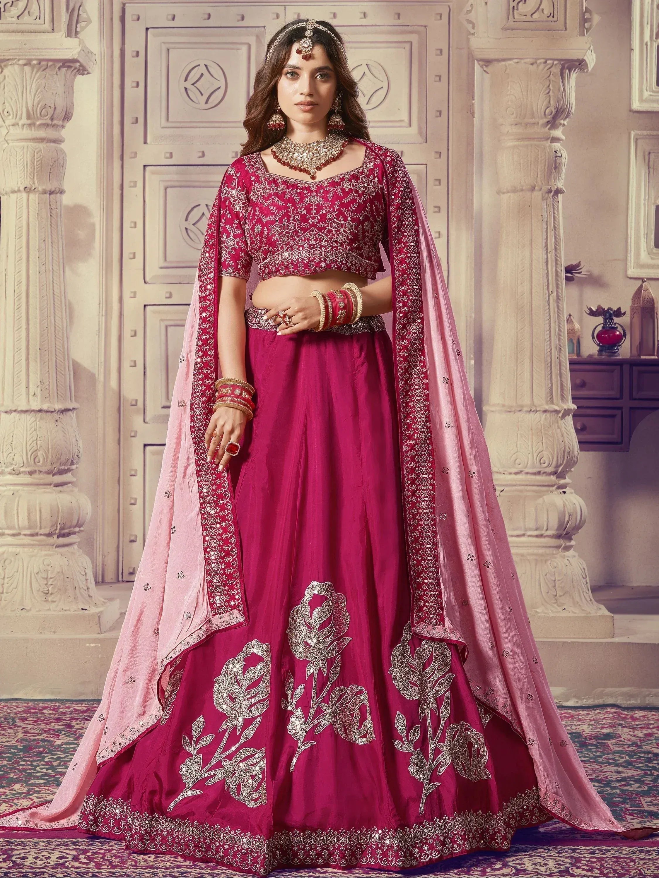Elegant maroon lehenga choli with floral embroidery and pink dupatta for Indian ethnic wear