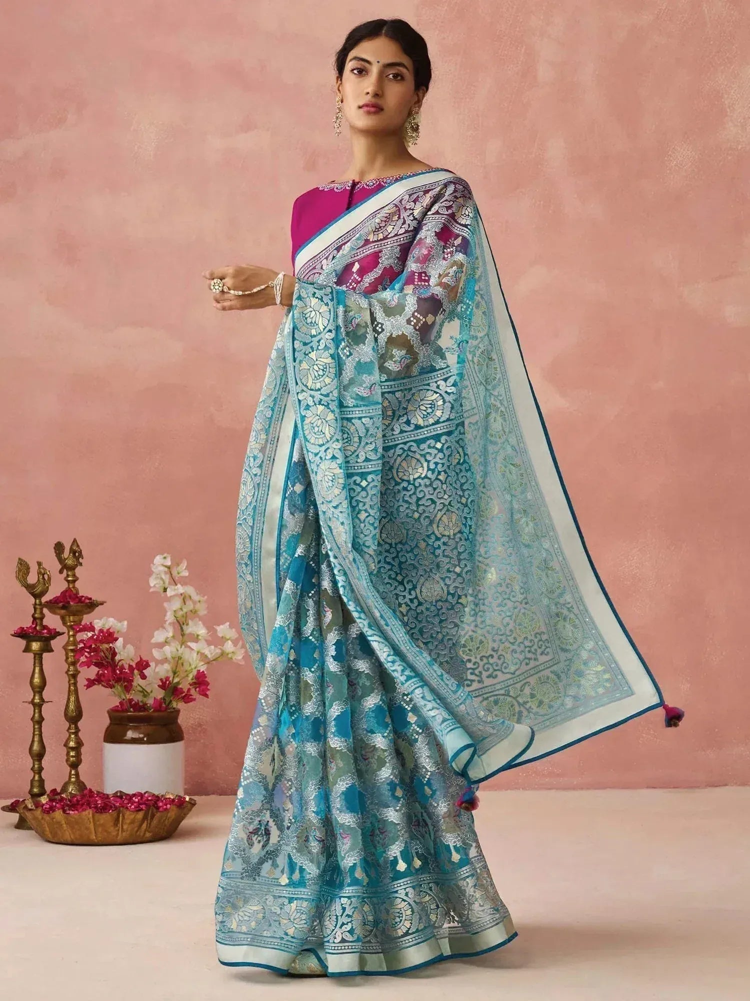 Blue and pink designer saree with intricate floral embroidery, perfect for Indian ethnic wear occasions
