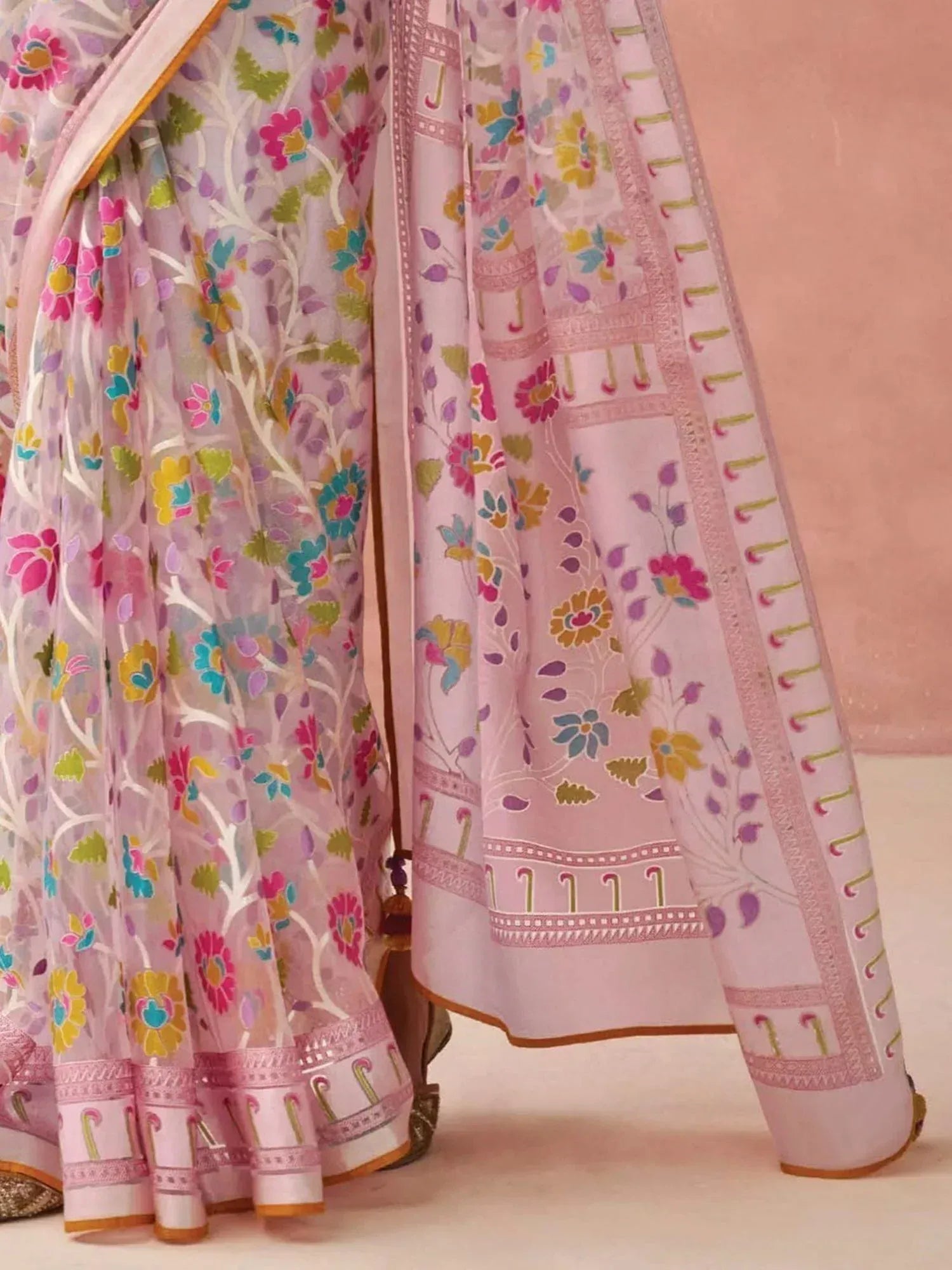 Pink floral printed lehenga choli with intricate border detailing, perfect for Indian ethnic wear