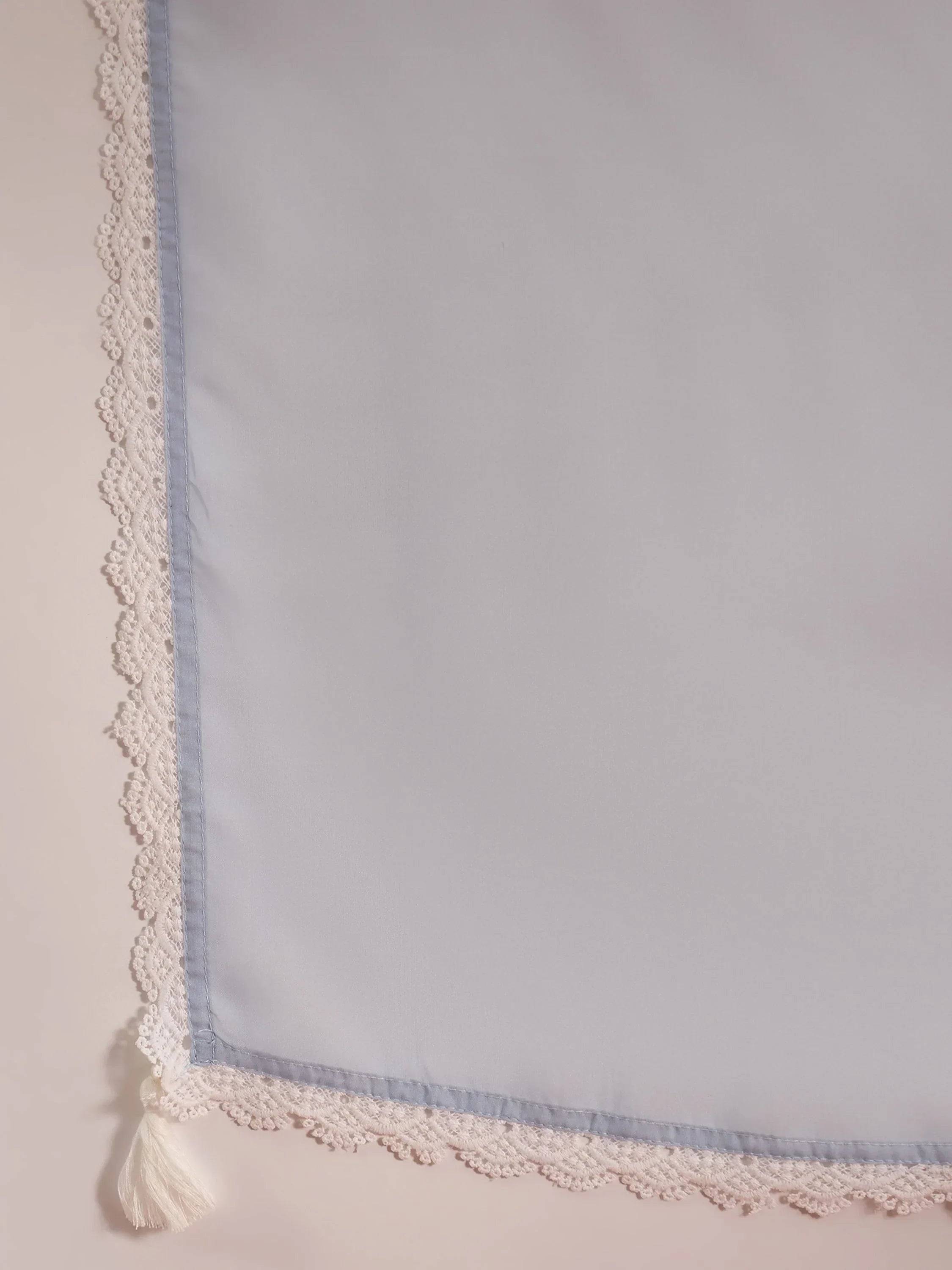 Light blue dupatta with delicate white lace border and corner tassel detailing
