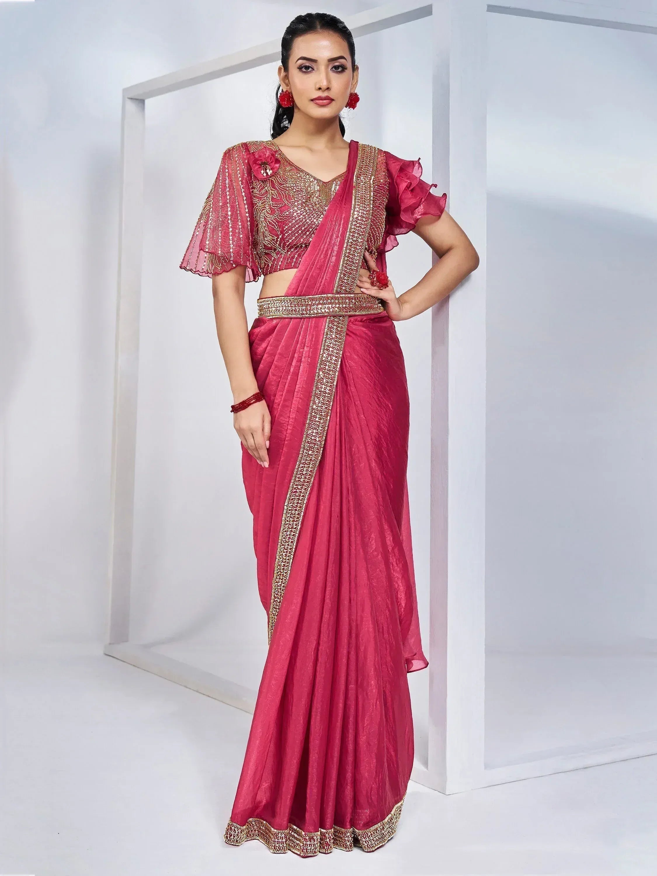 Pink embroidered saree with gold border and ruffled blouse, Indian ethnic wear