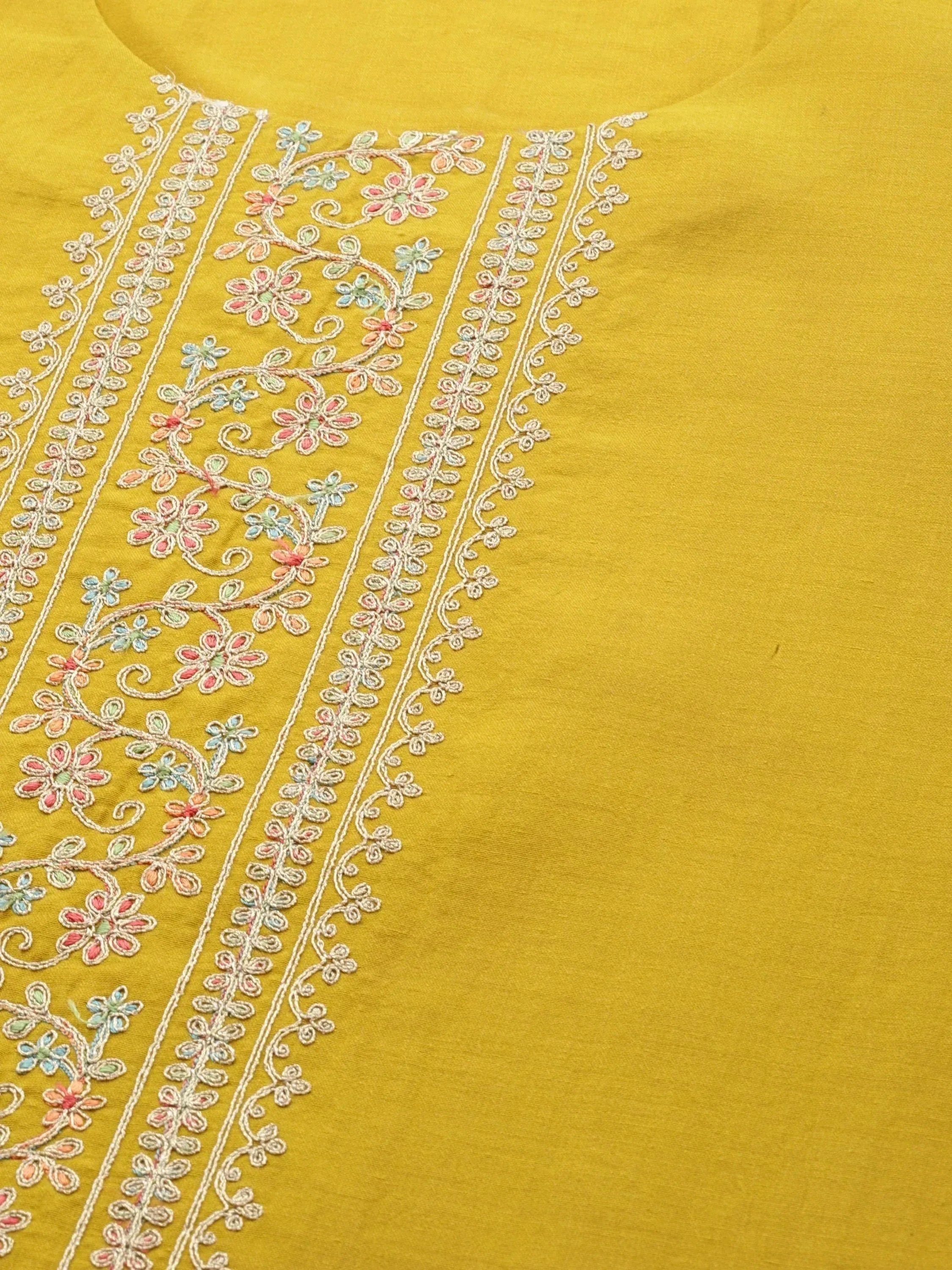 Yellow ethnic kurti with floral embroidery, perfect for Indian wear and festive occasions.