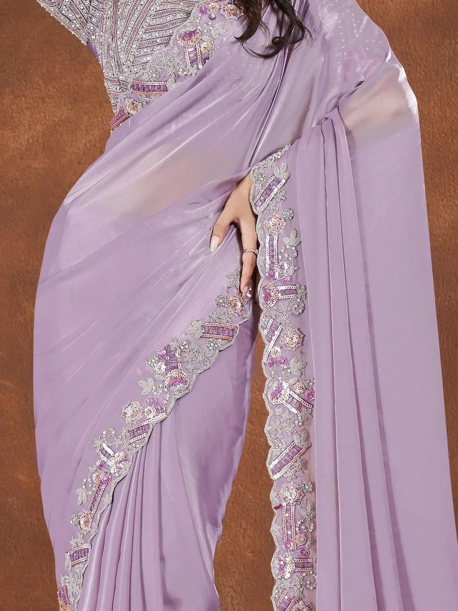 Lavender saree with intricate floral embroidery and sequin detailing, perfect for Indian ethnic occasions.
