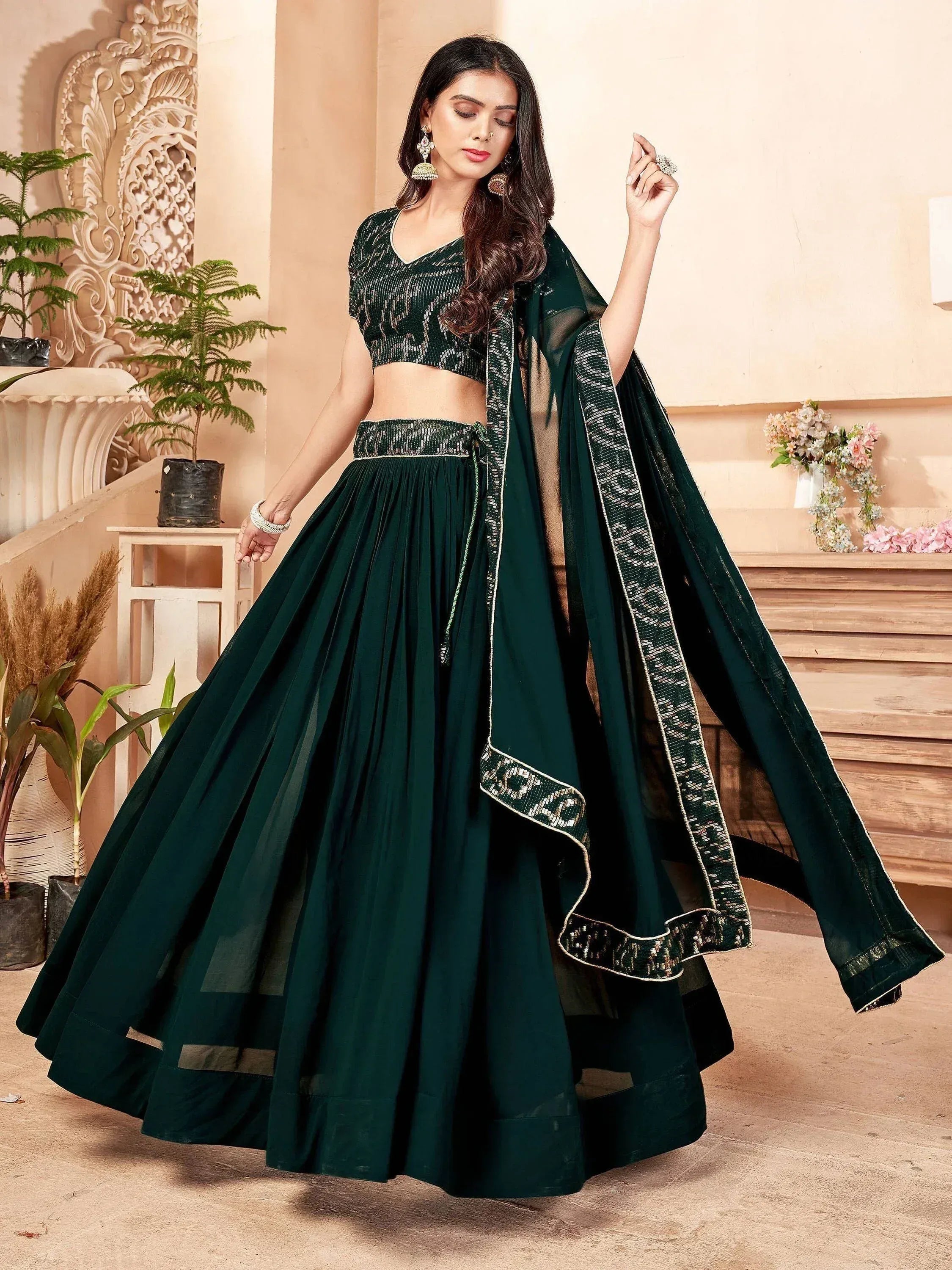 Emerald green designer lehenga choli with sequin work and sheer dupatta for Indian ethnic wear