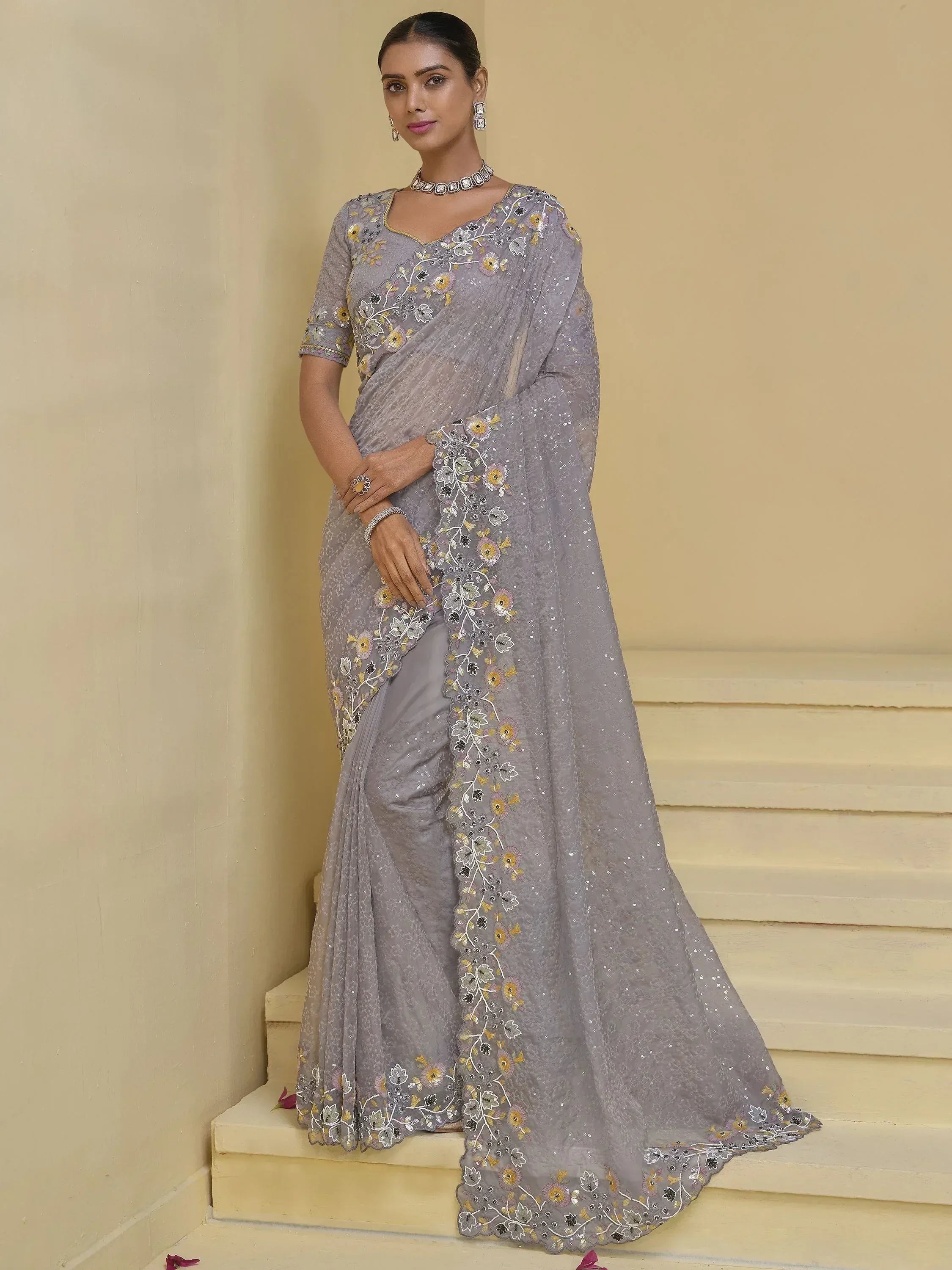 Grey floral embroidered saree with sequins, perfect for Indian ethnic occasions and weddings.